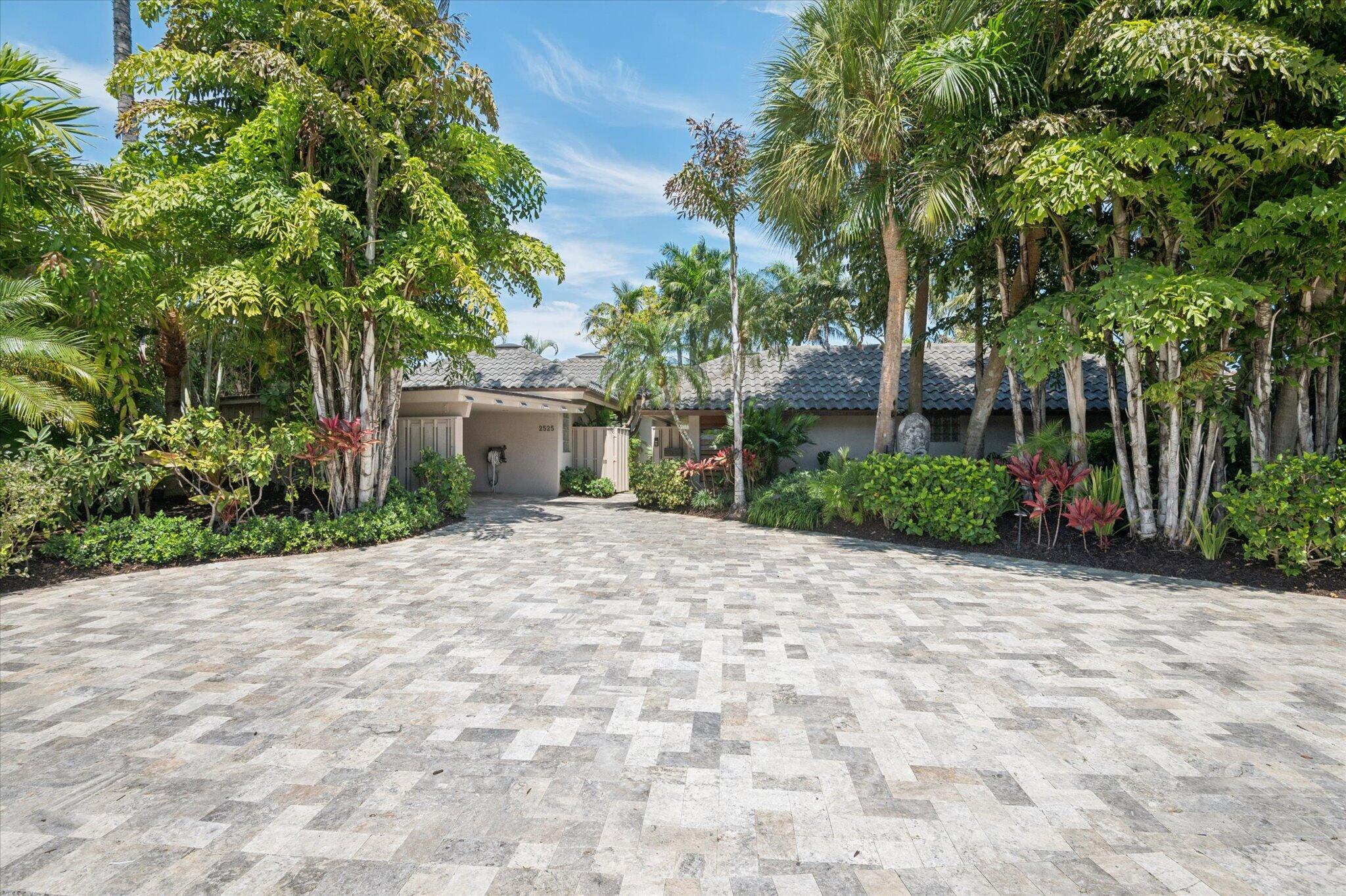 Exceptional waterfront residence in the exclusive and highly coveted neighborhood of Seven Isles off Las Olas Blvd, set on a 10,589SF lot with 80ft of waterfront, a brand-new seawall, and private dock. This private, gated retreat features a 2,532SF, 2BR / 2BA, main home, along with a separate 592SF, 2BR/2BA casita, ideal for guests, a home office, or gym. Vaulted ceilings, skylights, hardwood floors, and a designer kitchen with Sub-Zero, Thermador, and KitchenAid appliances elevate the interiors. Spa-like baths feature porcelain finishes, Toto toilets, and Kohler fixtures. French doors open to a resort-style backyard with stone pool deck and pool/spa with heater, chiller and bridge. Coyote outdoor kitchen, Control4 system, and attached carport complete this offering.