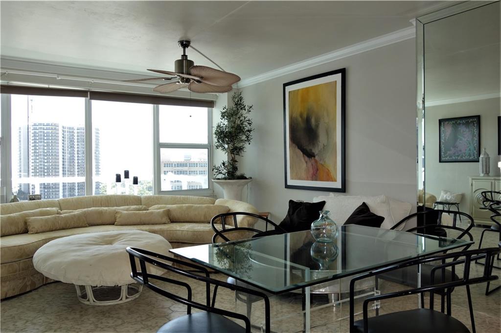 Top floor penthouse apartment with views of the ocean and skyline. This wonderful home has all impact windows tiled floors and updated appliances. Coral Ridge Towers has had its 40 year restoration and the new railings will be all glass with Miami piping. Just some of the many amenities include an intercoastal clubhouse, gym, heated pool, secured lobby and in house management. Water, sewer, trash, cable, interior pest control and central cooling tower for your ac.