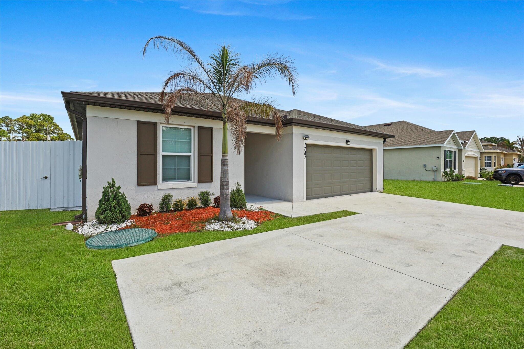 Welcome to this 2023 CBS home on a spacious fully fenced corner lot with no HOA! Inside, you'll love the bright open layout, split-bedroom design, kitchen island, ceramic tile, custom primary closet, glass shower enclosure, upgraded laundry cabinetry, new water heater, and UV light system in the A/C. The private-entry flexible suite with kitchenette, stove, refrigerator, and mini-split A/C units is perfect for guests, multigenerational living, a home office, or possible rental use. Relax on the screened porch, enjoy the 2-car garage and extra driveway parking, and take advantage of a great PSL location near highways, shopping, dining, and everyday conveniences.  Listing agent is related to owners. All measurements are estimates; buyers/agents to verify