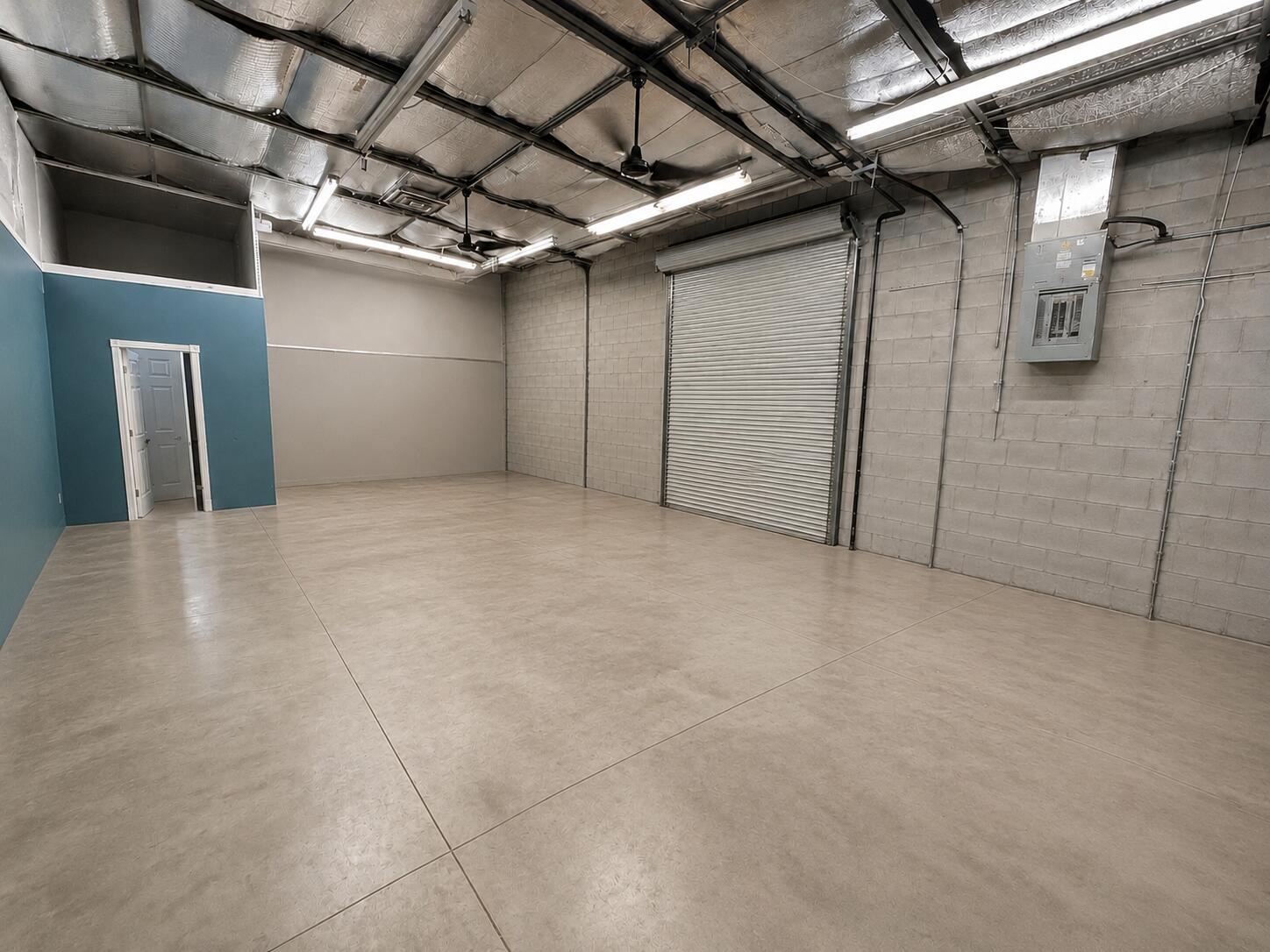 Stuart's well maintained single story business complex. of Willoughby Business Park offers 1,840 sq ft of which 882 sq ft is office space containing 3 offices one of which can be a conference room with French doors. Tile flooring through the office space. The unit has two bathrooms, one in office area and the second with shower in warehouse space. Whole unit is air-conditioned. 12 ft role up door for the warehouse space and parking. 3-5 year lease term, $22 a sq ft Gross lease.
