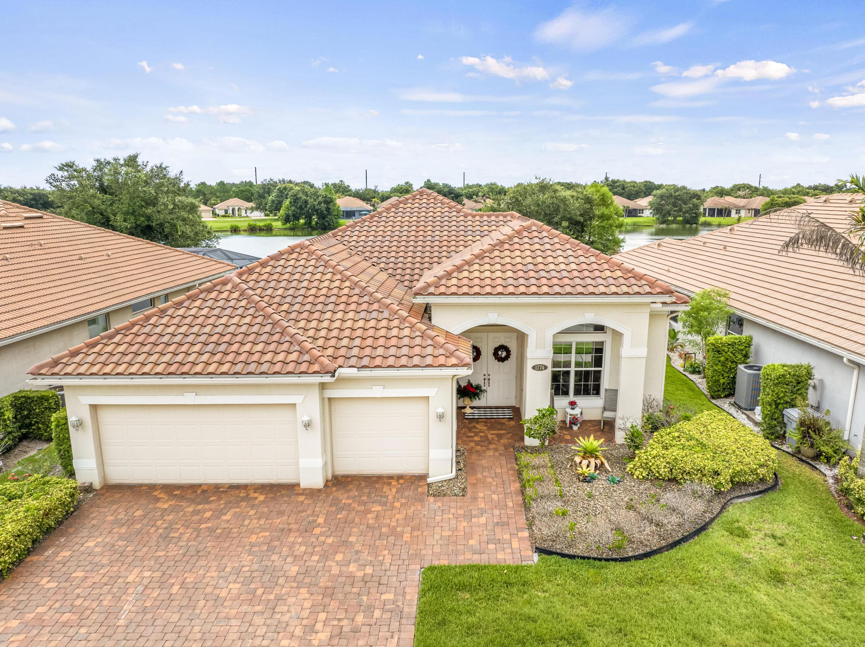 Enjoy lake views from this Monaco Supreme model in the gated community of Millstone Landing. Offering 3 bedrooms, 3 bathrooms, a den, and a 3-car garage, the home features a functional layout with quality finishes throughout. The kitchen includes quartz countertops, double wall ovens, and a bay window breakfast area. Impact windows and doors provide added protection, while granite countertops in the bathrooms and an upgraded Mediterranean elevation and diagonal tile flooring throughout add to the home's appeal. Residents enjoy a clubhouse, community pool, fitness center, and tennis courts.