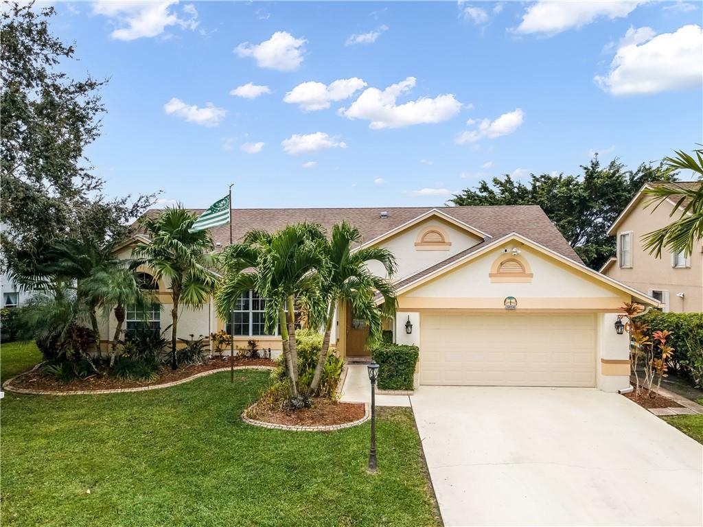 Welcome to your new home! This 3 bedroom 2 bath POOL home is situated on a great lot with east/west exposures and long lake views. This home features tile and wood flooring, vaulted ceilings with LED high hats and all popcorn removed. Spacious kitchen with newer SS appliances. Roof was replaced in 2012. AC and water heater both newer. Impact windows and French doors. Screened in pool enclosure and large covered patio great for entertaining. This home is situated within a family friendly community with low HOA fees and good public school zones. Publix shopping center within walking distance. This won't last, don't miss out... Turn key home ready for a new family.