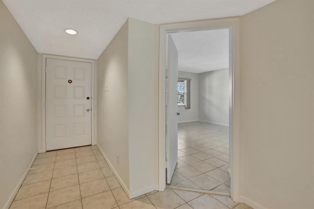 Welcome to this charming one-bedroom, one-and-a-half-bath condominium located in Cambridge at Century Village in Pembroke Pines, Florida. This well-proportioned residence offers 1,045 square feet of finished living space across four stories, providing an efficient layout for comfortable daily living. The thoughtful design maximizes functionality while maintaining an inviting atmosphere throughout the unit. Situated within the established Cambridge at Century Village community, this property represents an excellent opportunity for those seeking a move-in-ready condominium in the Pembroke Pines area.
