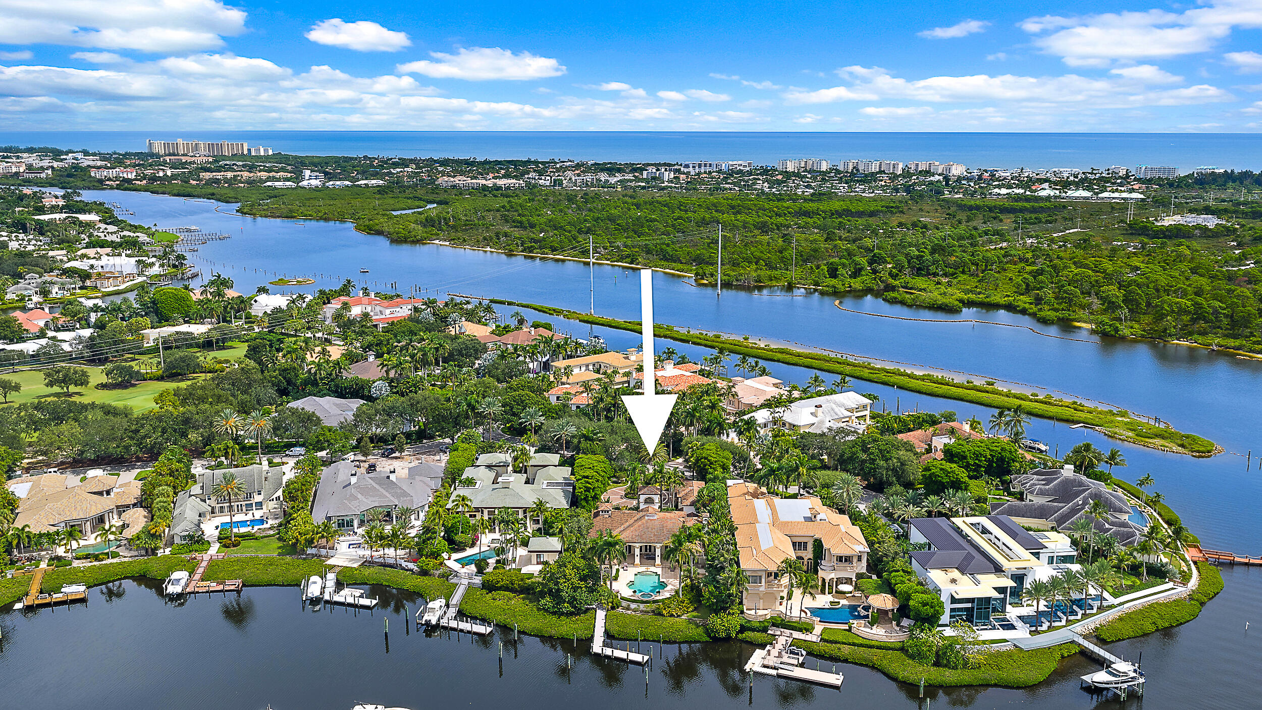 Experience waterfront living at its finest in this rare oversized estate property at 193 Spyglass Court in Admirals Cove. Situated on .66 acres, substantially larger than most lots in the community, this home offers uncommon space, privacy, and beautiful marina views. Located on a quiet cul-de-sac with no through traffic, it features a large estate-style driveway and thoughtful updates throughout, including a modernized kitchen and wine wall. Admirals Cove, recognized as a Platinum Club of America, is one of South Florida's premier private communities, offering a world-class marina with direct Intracoastal and ocean access, 45 holes of championship golf, tennis and pickleball, a full-service spa, multiple dining venues, and a resort-style clubhouse—delivering the ultimate waterfront life