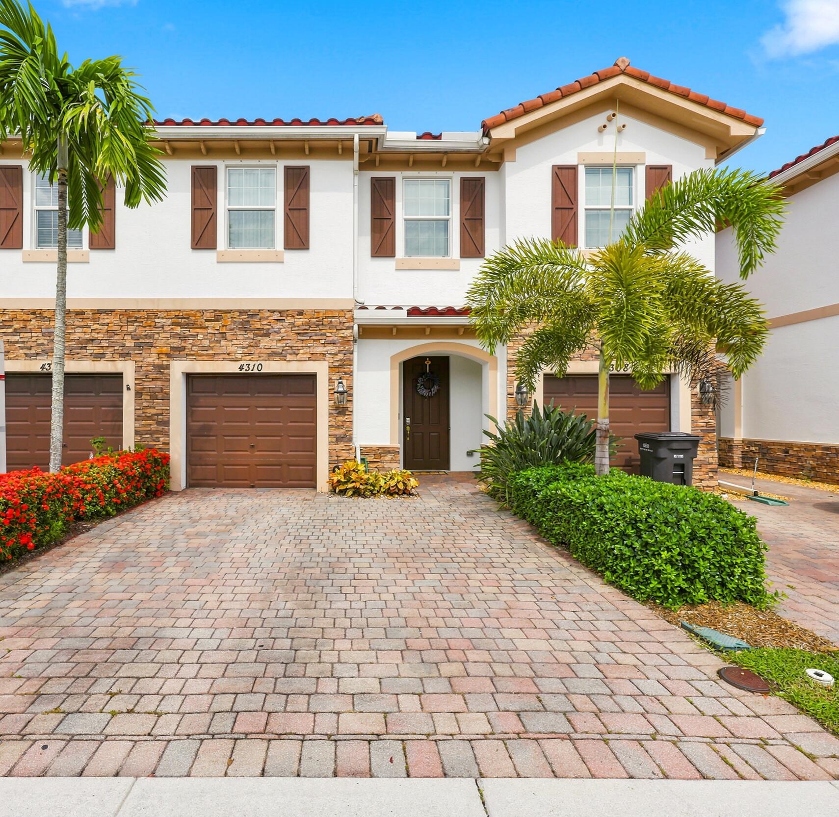 Welcome to this beautifully updated 4-bedroom, 3.5-bath home in the gated community of Charleston Commons. Built in 2015, this move-in ready residence offers 1,737 square feet of thoughtfully designed living space, featuring modern interior updates, a one-car garage, and a driveway with room for up to three additional vehicles. Step outside to your private, fenced-in patio—perfect for entertaining, relaxing, or enjoying outdoor dining. Residents of this well-maintained community enjoy access to a community pool, low-maintenance living, and a convenient location just minutes from shopping, dining, major highways, Palm Beach International Airport, and downtown West Palm