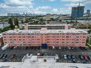 DRASTICALLY REDUCED!!!! ATENTION INVESTORS OR END USERS: OPPORTUNITY OF INSTANT INCOME, IT IS RENTED THROUGH DECEMBER 2026 FOR $2,000/M OR IF NEEDED TENANT CAN VACATE.  TASTEFULLY RENOVATED, CONVENIENT FIRST FLOOR UNIT WITH LARGE SCREENED PORCH WITH VIEWS OF THE POOL AND GARDEN. NEW FLOORING, DOORS AND APPLIANCES. READY TO MOVE IN. CENTRALLY LOCATED IN HALLANDALE VERY CLOSE TO SHOPPING, BEACH AND ENTERTAINMENT. ALL AGES BUILDING. CALL FOR APPOINTMENT (24 HOUR NOTICE) AND MORE DETAILS. SPECIAL ASSESMENT OF  $202/MONTH  WILL BE PAID  BY SELLERS AT CLOSING. MOTIVATED SELLER WANTS AN OFFER!!. CREDIT SCORE 640.