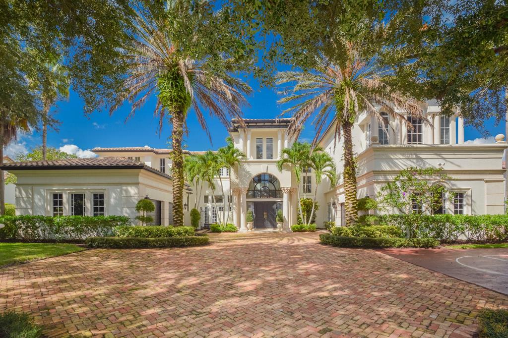 PRICE REDUCED NEARLY $500,000!! PRINCETON ESTATES...WOW!
The quintessential lifestyle of Woodfield Country Club is embodied in this elegant Mediterranean estate with a transitional contemporary interior; almost 9,000 square feet of living space includes 6 bedrooms, 7 full baths and 2 half baths in the private enclave of Princeton Estates. An inviting living room with fireplace showcases the sprawling fountained pool, covered loggias, summer kitchen and patio views, all overlooking the golf course, sunsets and the western horizon. Features also include a dramatic staircase leading to the upstairs master suite, gym, playroom and 3 additional en-suite bedrooms. Billiard room, office and en-suite bedroom on first floor. Impact glass windows, 4-bay garage, five-zone AC and back-up generator.