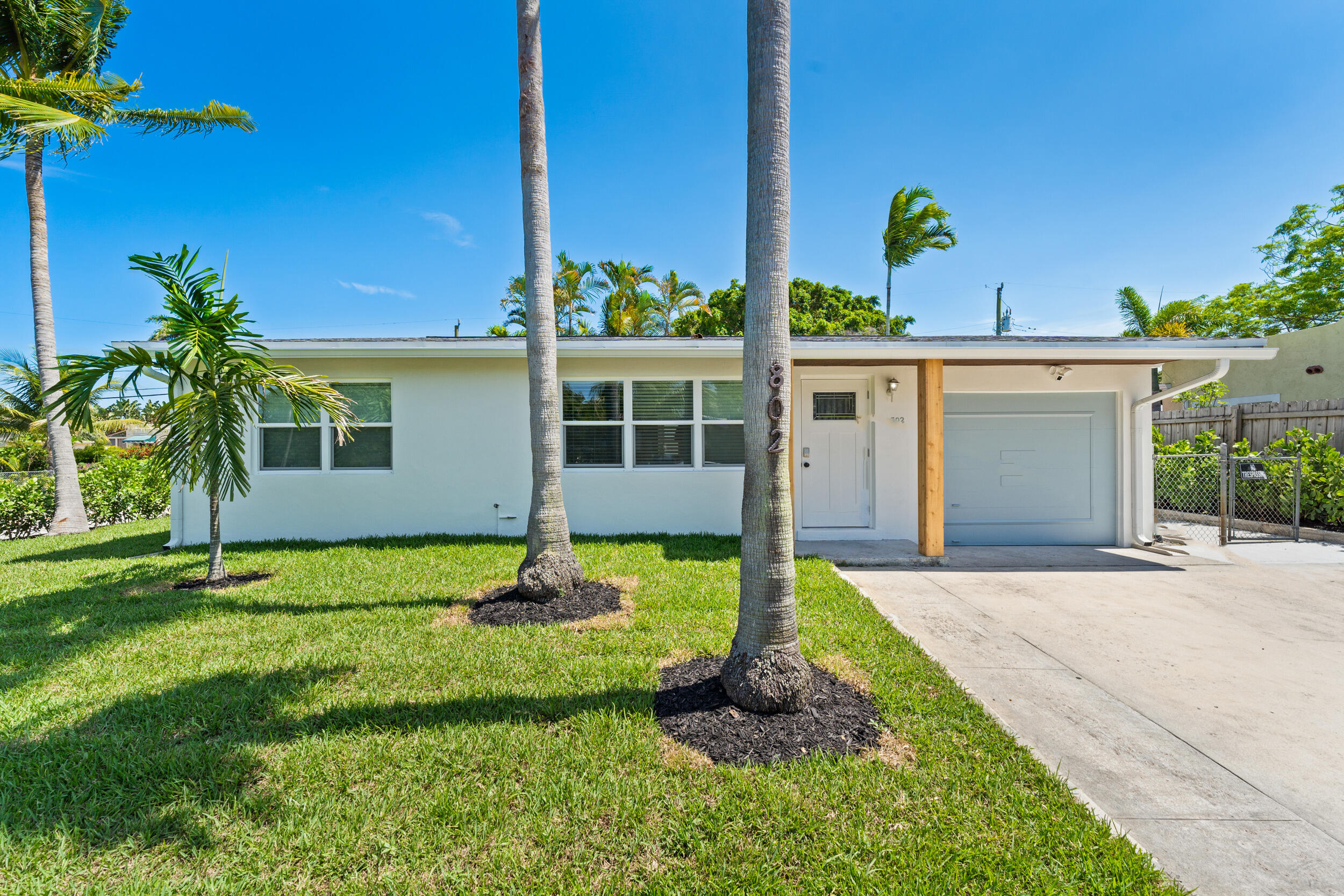 Fresh and cheerful, fully remodeled home in the heart of West Palm Beach! This beautifully updated 2 bedroom/1 bath home PLUS detached studio and 1 car garage sits on a large, fenced corner lot and is conveniently located in a friendly neighborhood and is close to I-95, Dixie Hwy, beaches, shopping, restaurants, schools and PBI Airport. Enjoy living in a light filled home with new kitchen/appliances, new flooring, new impact windows, new bathrooms and new landscaping. The detached space can be used for a home office, hobbies or guests.