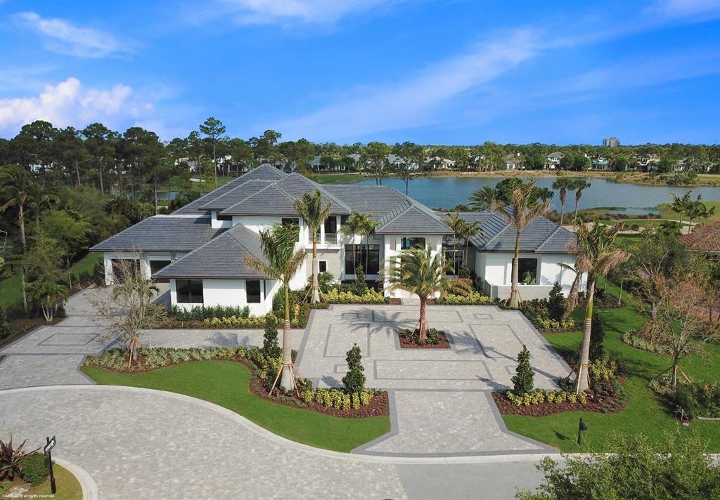 Look no further! Now offering a beautiful and spectacular custom built 2018 residence in the prestigious golf club community of Old Palm, there is nothing as new! This 5 bedroom, 6.2 bath transitional home with 8,427 living square feet and 12,091 total square feet is now available for purchase. Upon entering the spacious foyer your eyes immediately take you through the 12' floor to ceiling windows through to the resort style pool area and gardens with golf course and lake views beyond. The large living room has a formal dining area and huge wine room apropos for a fine wine connoisseur and steps to a magnificent loggia and summer kitchen. The 1st floor master bedroom suite offers an office, his and her baths and walk in closets fit for a queen and king. The kitchen opens onto the great room with additional dining area and includes gas 6 burner Wolfe range, Thermador refrigerator/freezer, custom cabinetry and full walk in catering kitchen. Two of the 4 additional bedrooms suites are located on the main level and offer privacy away from main living areas. Facing the rear of the property is the club/theater room with exceptional custom audio visual equipment and theater screen-you will think you are in a movie theater! Dark out shades to enhance your movie watching experience. Two powder rooms and laundry complete the main level. The second level is perfect for guest/in-laws or a teenager's private oasis. 2 bedroom ensuites and tv area. Hurricane impact glass throughout which includes sliding doors that disappear into the walls for a tropical Caribbean feel and great space for a large dinner parties. For your toys, a six car garage to show case your finest automobiles. All of this on over an acre of land. The clubhouse has old world charm and is warm and cozy. Impeccable service and delicious offerings. Fitness center, spa, and much more. Oh, you miss the beach? Old Palm Members enjoy a private membership to the Singer Island Hilton Resort offering beach accommodations, food, drink and spa, approximately 10 miles from your door.