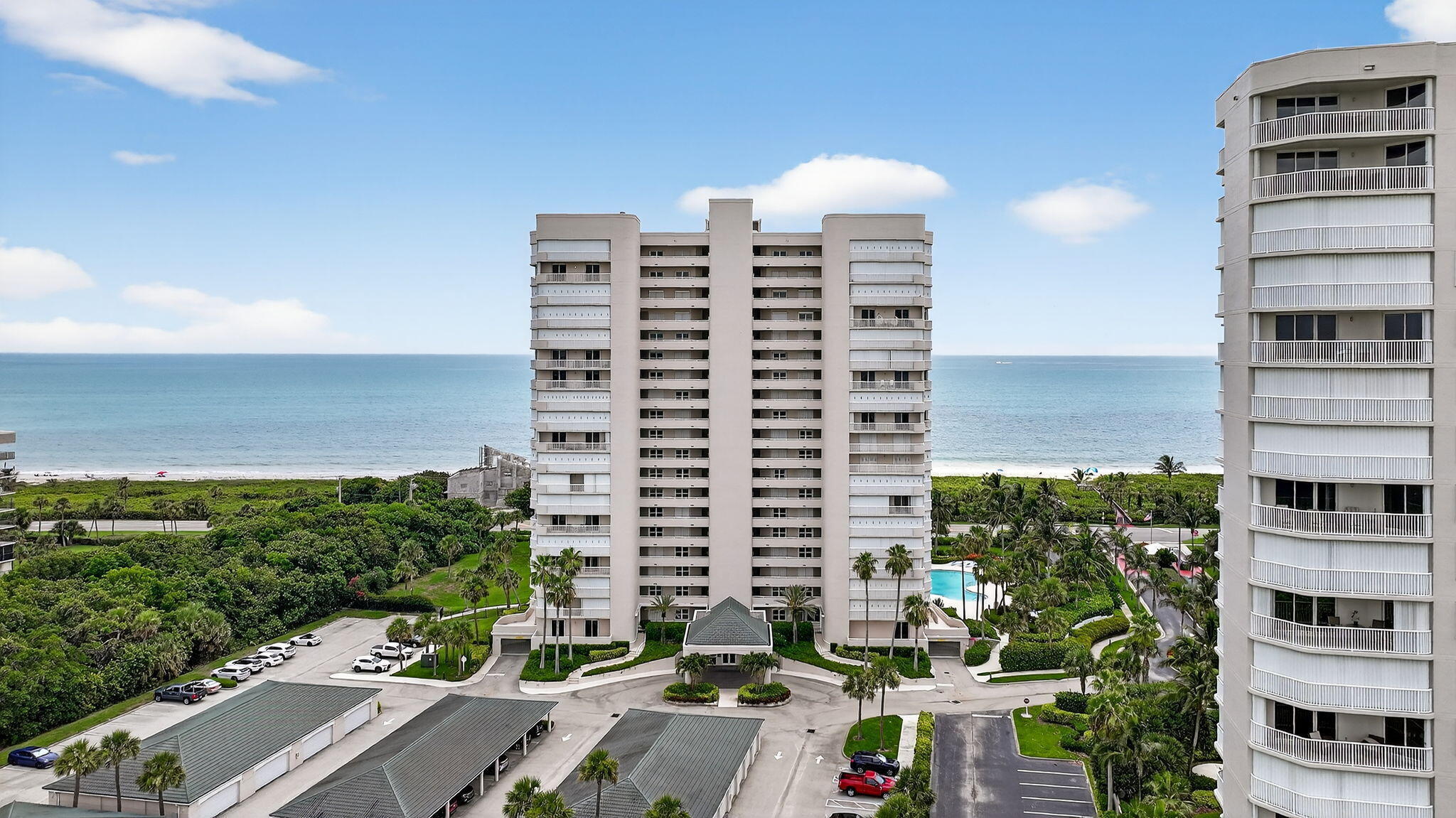 Live the Lifestyles of the Lavish and Oceanfront in this 3-bed, 2-bath NE corner condo with 1,724 sq. ft. of luxury and over 900 sq. ft. of wraparound balcony. Just steps to your private deeded beach and oceanfront pool, this 1st-floor residence offers the feel of a private home with all the perks of resort living. Enjoy the gym, sauna, pool table, and more in a premier oceanfront community—no elevator needed, just walk right out to paradise. Coastal dreams await in your serene seaside sanctuary—refined, relaxing, and ready for you. Room sizes appx. & subject to error.