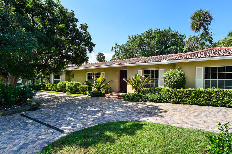 Fantastic Palm Beach home located only two homes from the beach.  The house is in excellent condition with a large heated pool and patio. There are three bedrooms, three bathrooms and an office. There is private beach access with a grill, tables, and shower.