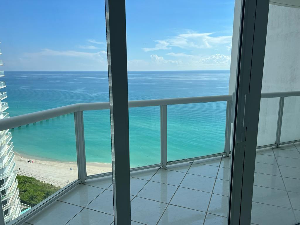 Wake up to breathtaking direct ocean views from the living room, dining area, and expansive primary suite. This impeccably maintained residence is in mint condition, featuring newer tile floors, fully remodeled bathrooms, and a sleek modern kitchen with quartz countertops and custom cabinetry. Top-of-the-line impact windows throughout offer both elegance and security. The primary suite boasts a spa-inspired bath with soaking tub, separate shower, and dual sinks. Secondary bedrooms showcase city and Oceania Island views. Enjoy resort-style living at Oceania with private beach club, spa, fitness center, dining, beach service, 24-hour security, concierge, and valet.   Building pool is under renovation, last phase that will be ready on July approximately and access ready on September aprox. Pool and ammenities are on the 4th floor.