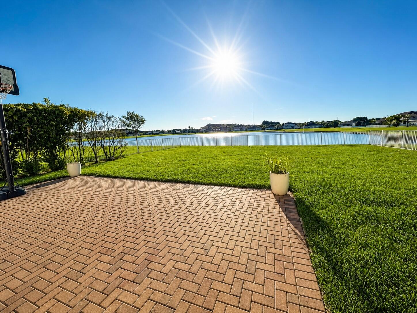 OPEN HOUSE THIS WEEKEND (7/18 & 7/19 12PM-3PM) The moment you walk in, you'll know you're home. Designed to impress and made for everyday living, this beautifully upgraded home features a breathtaking custom chandelier, a one-of-a-kind wet bar, and serene lake views framed by just the right amount of privacy. Whether you're entertaining guests or enjoying a quiet evening by the water, every detail feels like a luxury getaway. This isn't just a place to LIVE it's a place to LOVE! Owner Agent