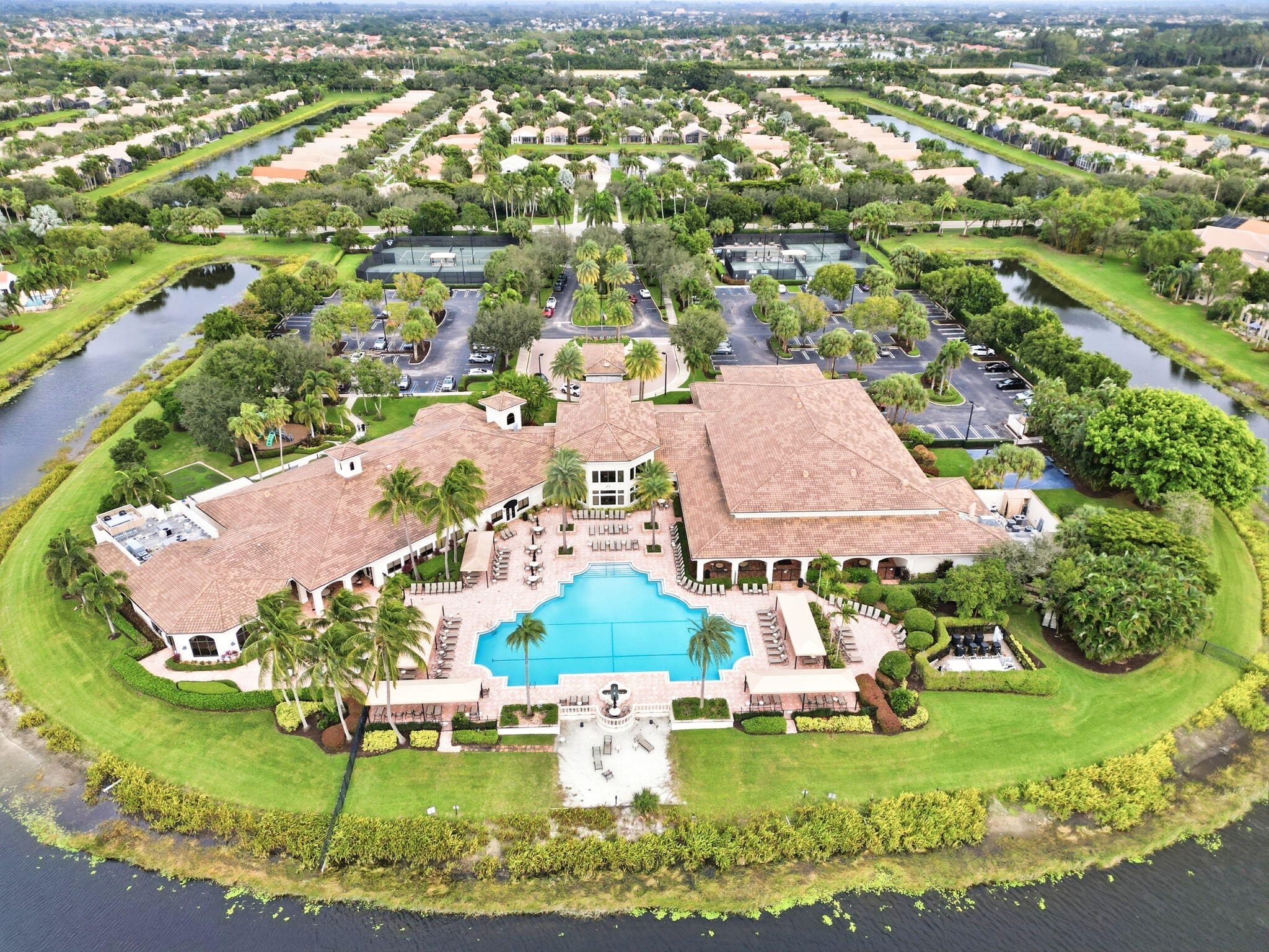 Welcome to this stunning remodeled 4-bedroom, 2.5-bathroom single-family residence in Valencia Shores 1, Greenacres, FL. Spanning 2,683 square feet of finished living space on one floor, this home offers comfortable proportions and practical layout. The waterfront setting provides a distinctive property characteristic, while the 2-car garage ensures convenient parking and storage. This well-appointed residence is designed to accommodate modern living needs with its generous bedroom count and multiple bathrooms, making it a versatile option for various homeowner preferences. 2026 Tile Roof being installed, 2026 HVAC