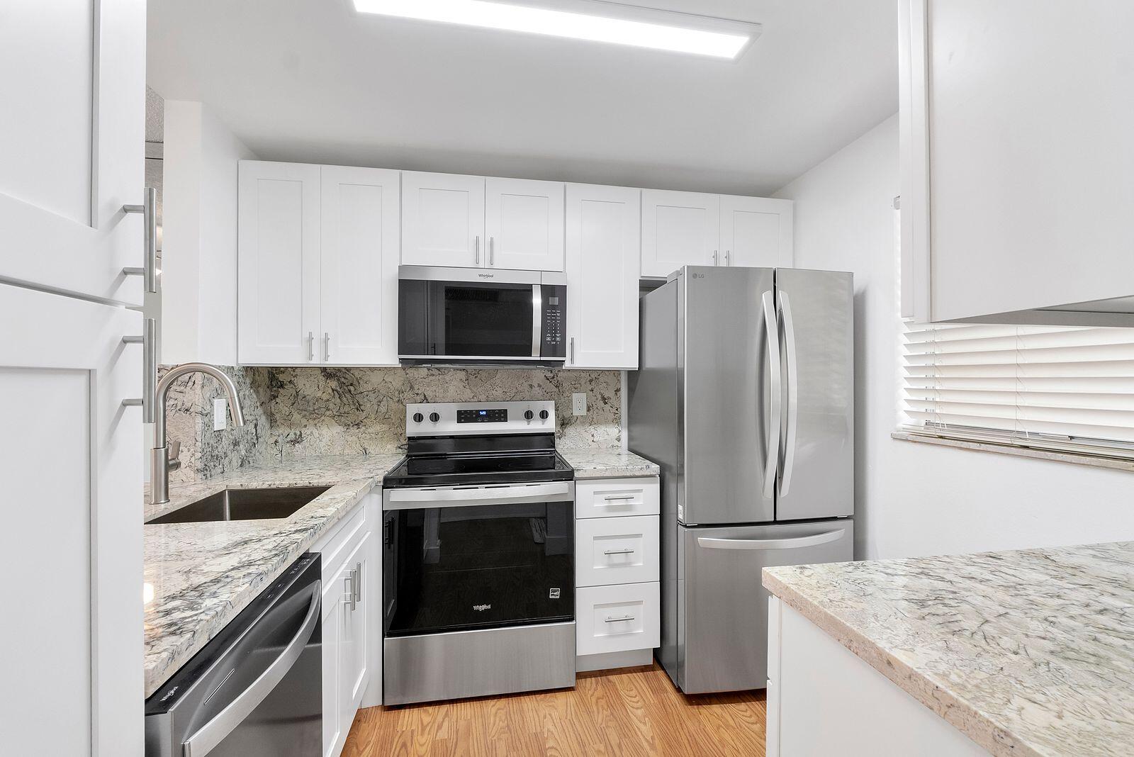 Location, Location, Location! Welcome to desirable Poinciana at Pine Island Ridge, conveniently located near shopping, dining, major highways, Nova Southeastern University, and so much more. This beautifully maintained second-floor unit features a brand-new updated kitchen, fresh interior paint, and stunning water views that create a peaceful and inviting atmosphere. Enjoy the convenience of easy access via stairs or elevator. Whether you're looking for a primary residence or a seasonal retreat, this move-in-ready condo offers comfort, convenience, and an unbeatable location in one of Davie's most sought-after communities. Don't miss this opportunity!