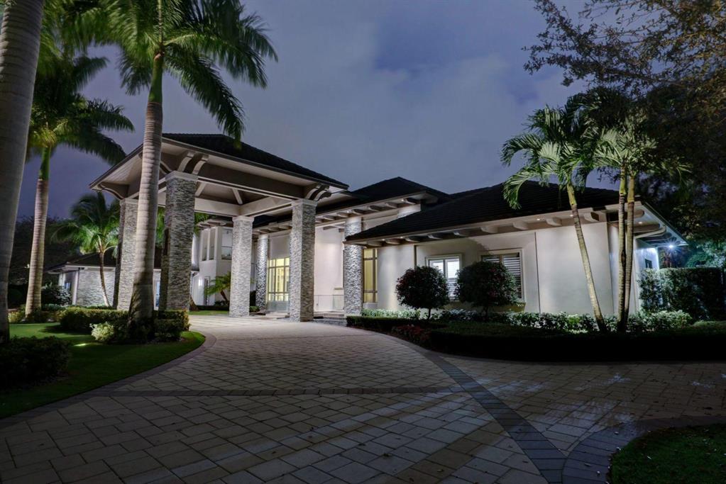 Pinnacle estate home in Old Palm Golf Club boasts 13,000 square feet of living space, 6 bedrooms, 8 bathrooms, 6 car a/c garage and sensational pool area, all created in an elegant, warm transitional style. The property is privately gated and fenced, leading to this special home with jaw dropping curb appeal and design. Situated on the Raymond Floyd signature golf course and nestled in the heart of Palm Beach Gardens, this home provides an oasis of privacy in an extremely convenient geographical location, close to all the desired amenities to include dining, shopping and very easy airport access. If a warm, tasteful lifestyle with wonderful entertainment areas is your wish, this home provides great options. The chef's Kitchen/great room area flows into a one of a kind (continued below) Indoor/outdoor air conditioned loggia with seating, full bar, summer kitchen and stack-able doors that offer closed or open access to the stunning pool area. Adjacent is also a full indoor game room, complete with temperature controlled wine room and beautiful fireplace. Upstairs is a full suite and entire gym set up, including an indoor putting green. The master bedroom defines opulence with a huge oversized master closet and spa like master bathroom. This home is offered fully furnished, including custom art work and wall designs. Floating ceiling details, lighting and wonderful natural light are all huge benefits. The club membership is not mandatory for this property but definitely available. Please contact us for a private showing of this world class estate.