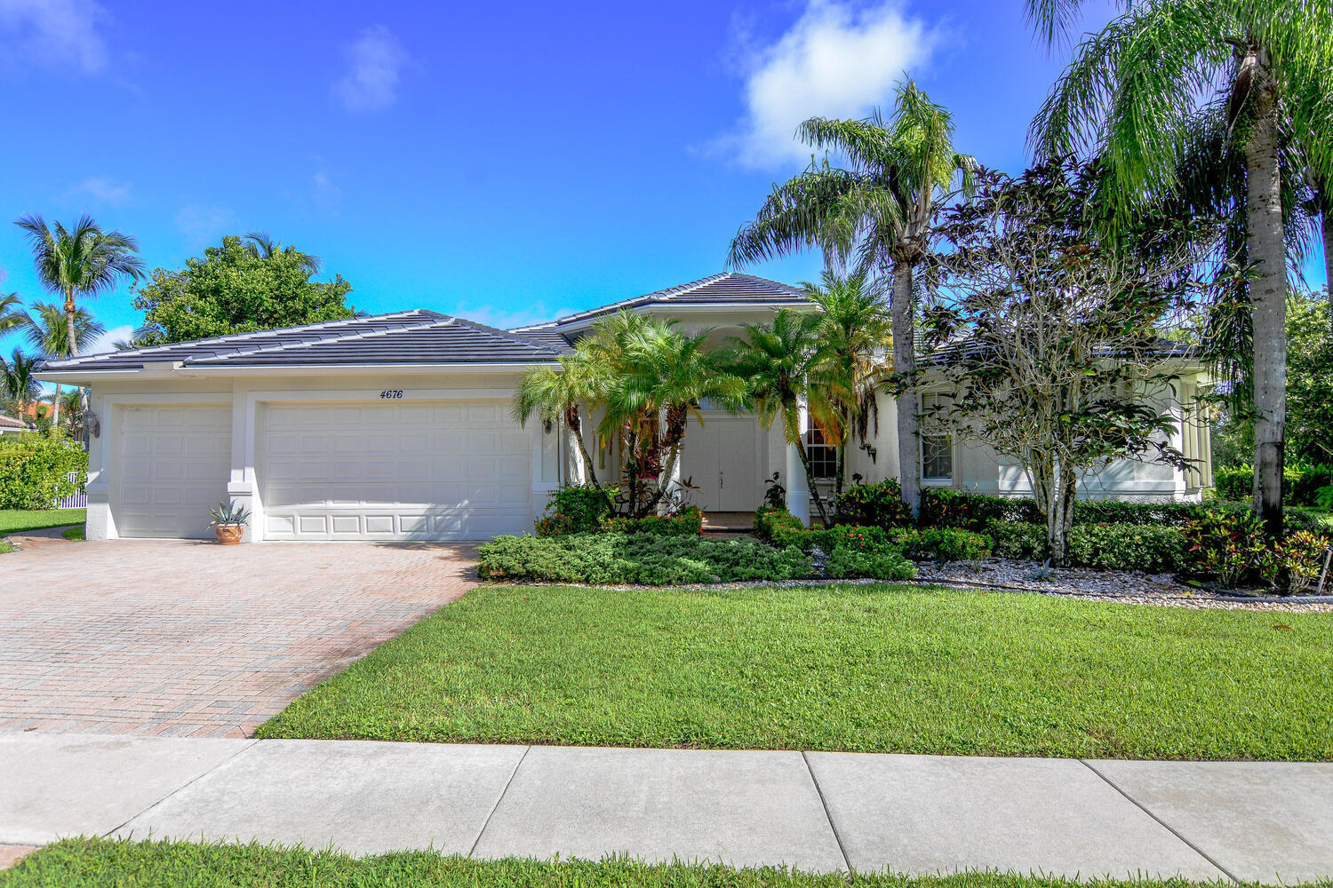 Welcome to your own private oasis in the desirable Manderly Bay Estates community! This beautiful and spacious single-story 4/3/3 and office is perfectly situated on a generous 0.36-acre lakefront lot, offering the ideal blend of comfort, privacy, and resort-style living. The open-concept floor plan seamlessly connects the living spaces to the outdoor retreat. Step outside to a fully screened, solar-heated pool and spa, complete with inviting seating areas where you can relax while taking in peaceful lake views and stunning sunsets. Recent updates provide added value and peace of mind, including a new roof and exterior paint completed in 2025. The Isles offers the security of a guard-gated community and access to outstanding amenities, including a clubhouse, fitness center, and tennis.