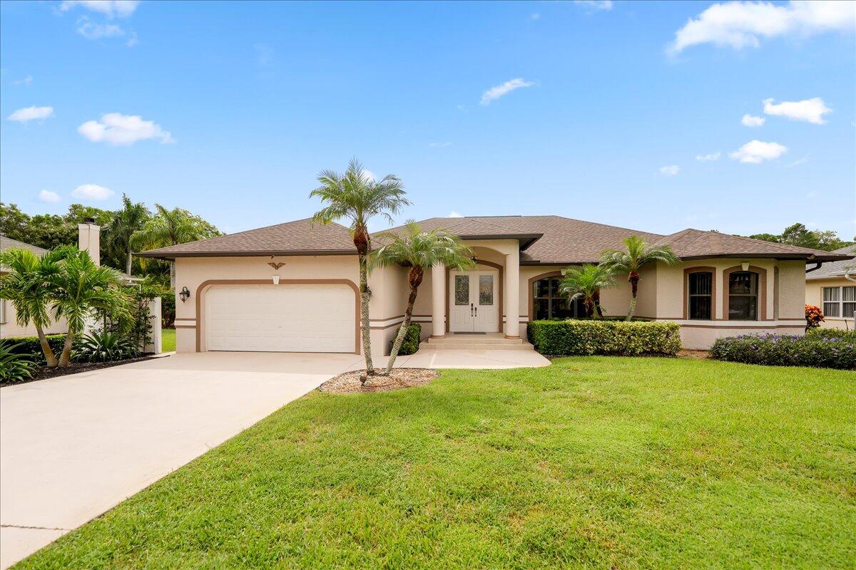 Come see this hidden 4/2/2 with a waterfront pond view in the desirable Osprey Ridge community. This home was built for entertaining in mind with windows and sliders that wrap around the home that leads to the stunning large pool deck and covered patio area, an entertainer's dream! Osprey Ridge has a LOW HOA of only $400 a quarter. This custom home also features recent upgrades- roof 2023, A/C 2022, and SS appliances 2023. With an impressive over 1/2 AC lot with a preserve and pond view for added privacy ,screened pool/spa, crown molding, separate family/living, large open updated kitchen with island and pass thru window, custom lighting, cabana bath, lots of counter space, generator hook-up, oversized garage, security system, and impressive soaring ceilings. CALL TODAY FOR YOUR SHOWING Home alos features a Rachio Sprinkler system that is connected to the well for added savings. It also has a 6 zone wifi enabled controller. Also included is lanscape lighting and there is a CCTV cameras and NVR is included.