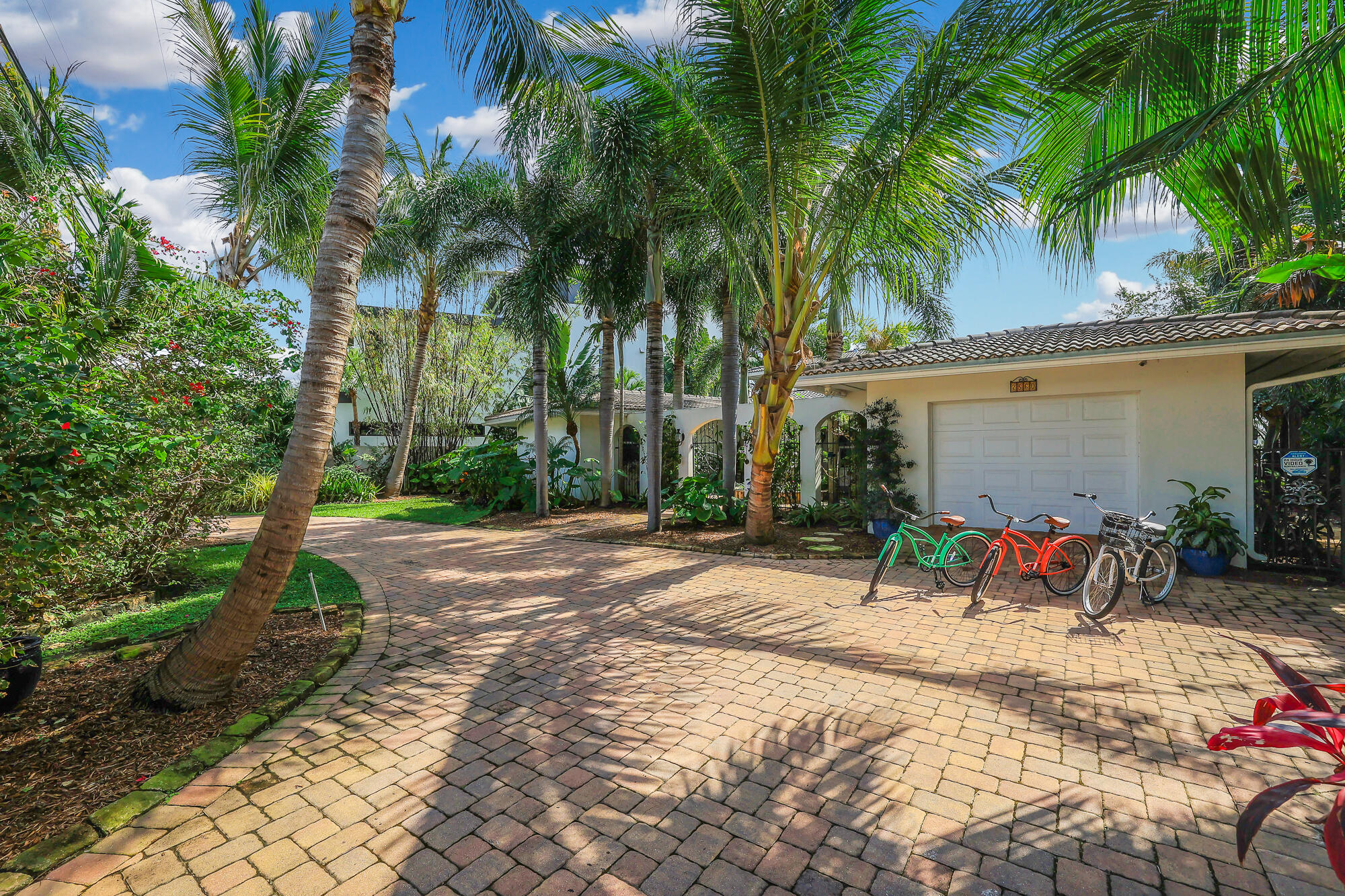 ENDLESS VIEWS! This luxurious Waterfront Estate has infinite views of Lake Santa Barbara and the intracoastal waterway. Walk through the wall to wall impact sliding doors to enjoy a relaxing swim in the salt water lagoon style pool (which is heated) or sit back and enjoy the beautiful sunsets. Impact windows throughout. 3 A/C's replaced 2020 under warranty. There are so many extras to see here. LED lighting surrounds the pool. A Tiki hut where you can enjoy a drink with friends. The lush tropical landscaping gives you the feel of being in paradise. Chef's kitchen with natural gas cooktop. Finger dock and dolphin pilings that can host a large boat/yacht with no fixed bridges. Seawall in good condition. Easy access to the Ocean. This home is a must see.