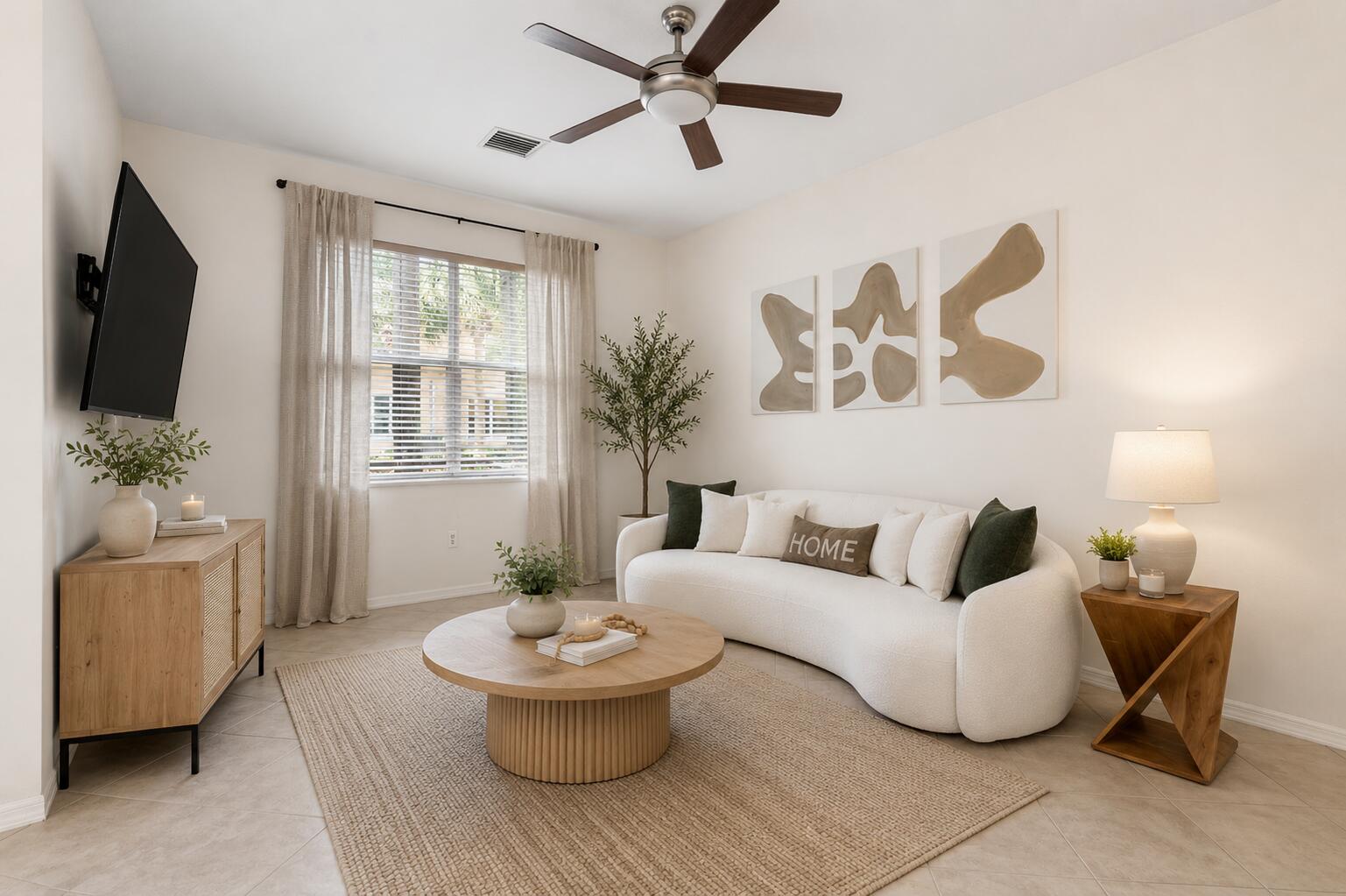 Beautifully updated 3-bedroom, 2.5-bath townhome in the gated Seminole Lakes community. The open-concept layout features a remodeled kitchen (2023), spacious living and dining areas, half bath, 1-car garage, & screened patio on the first floor. Upstairs offers 3 generously sized bedrooms, 2 full baths, laundry, and a spacious primary suite with a walk-in closet, dual vanities, soaking tub, and separate shower. Recent updates include luxury vinyl flooring on the 2nd level (2024), new garage door motor (2022), water heater (2021). Seminole Lakes is a gated, all-ages, pet-friendly, low HOA fee community with 2 pools, playgrounds, basketball courts & walking trails. Conveniently located 15 min to PBI, <1/2 mile to boat/ RV storage, Calypso Bay Waterpark, Costco, Starbucks, shopping, dining.