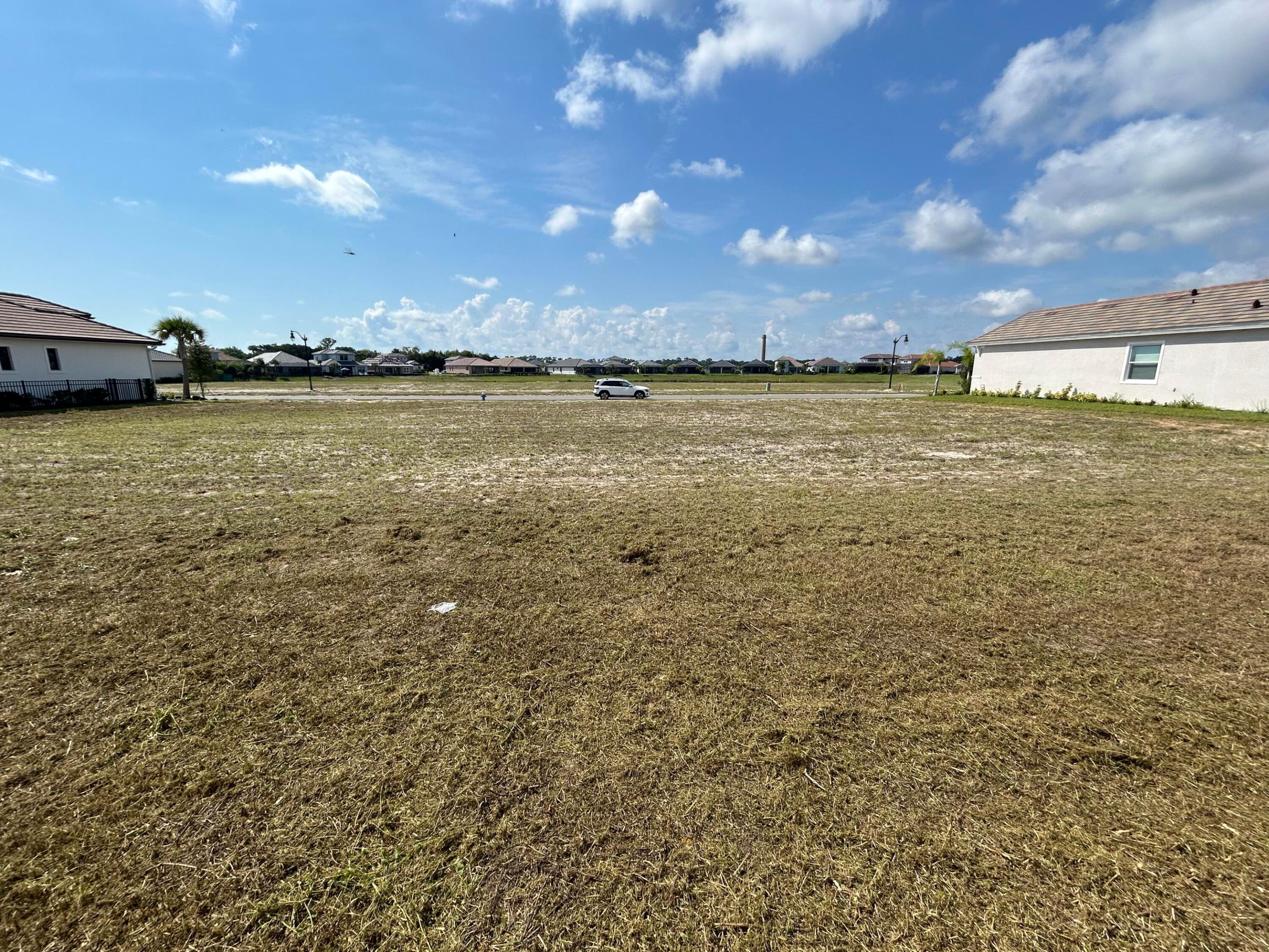 OWNER FINANCING AVAILABLE. Exceptional opportunity to build your custom dream home in Marina Del Palma, Palm Coast's premier gated boating community. One of the best-priced homesites currently available, this property offers buyers a unique combination of flexible seller financing and luxury coastal living. Marina Del Palma is a master-planned community located along the Intracoastal Waterway featuring a private marina with Dry-dock storage for your 30ft boat, waterfront clubhouse, resort-style pool, fitness center, tennis courts, dog park, and beautifully maintained grounds. Residents enjoy a boating-focused lifestyle with convenient access to the Intracoastal and Atlantic Ocean. Broker/Owner