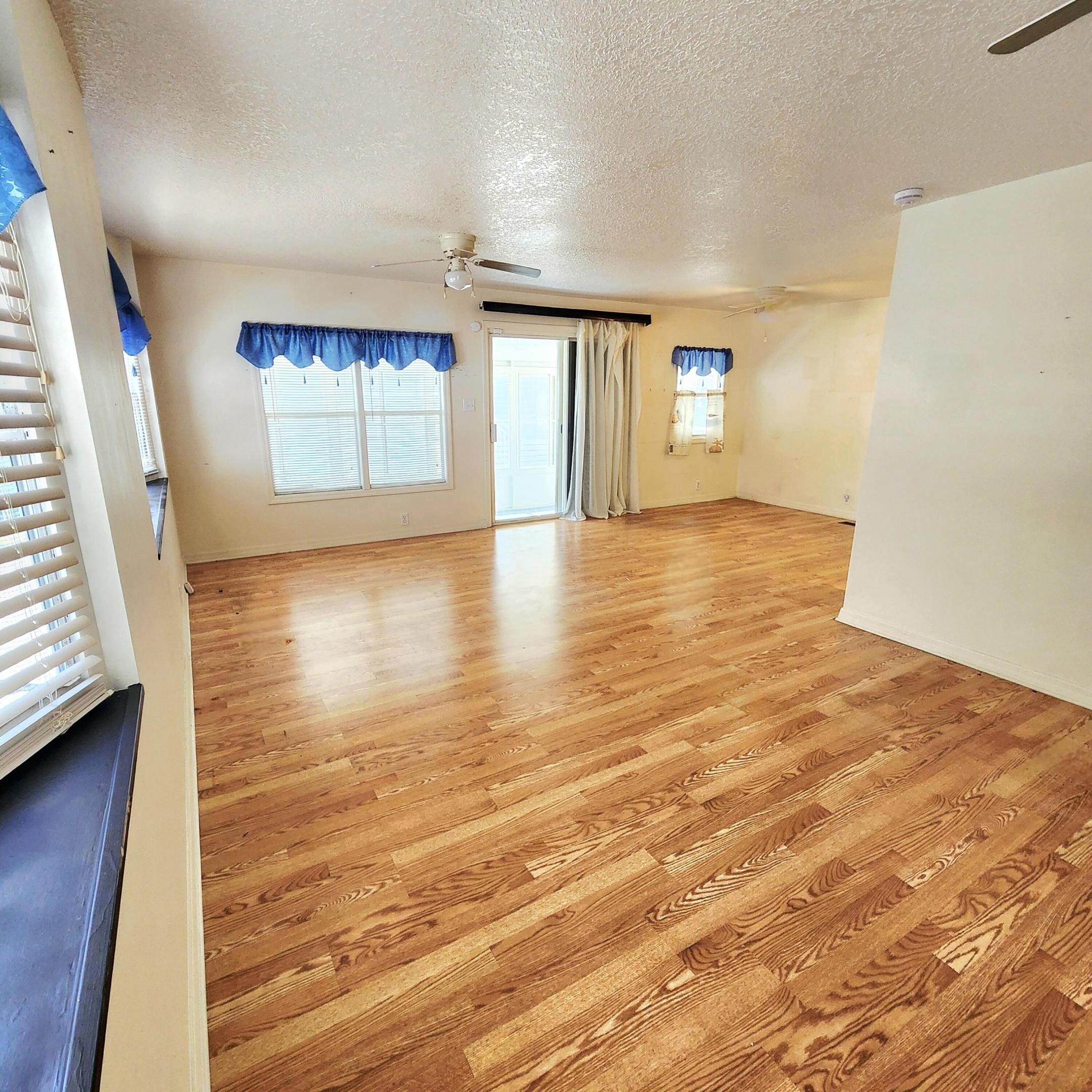Just Reduced! MUST SEE! Don't miss out! Private Yard w/ 2 bed/2 bath on a cul-de-sac w/ a Large, Well Lit, Enclosed Florida Rm, serves as extra room/den/office & more! Beautiful flooring, brightly lit home. Master bed. boasts en-suite bathroom. Step outside & it gets better - find a Large Shed & Outdoor Closet for ample Storage! Gardener's delight! Tropical vibes, lots of greenery & private small yard area for Planting, Pets & More! Storm Shutters Available. PRIME LOCATION; close to the beach, the mall, grocery stores, diners, coffee shops, post office, banks, pharmacy, hospitals & more. Lot Lease 842.53 includes lawn care, trash, Private Free Golf Course,Heated Pool,Pickleball, Tennis, Shuffleboard, Bocce,Gym,Library, cards, Mahjong, Bible study, Workshop, Dinners, Parades, Dances & more!