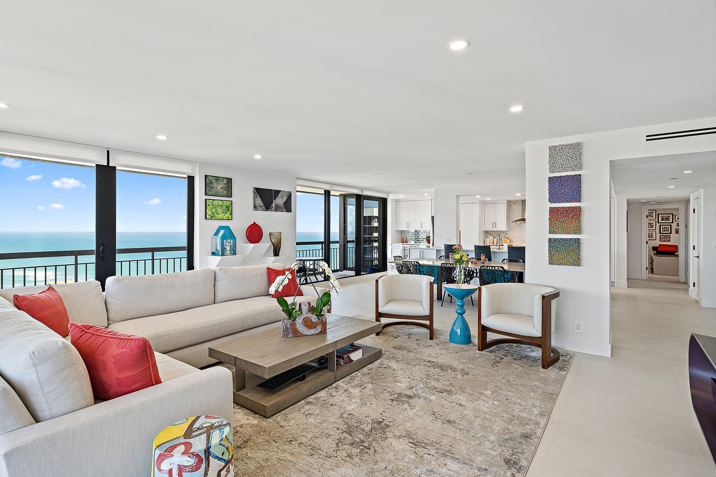 Exquisite oceanfront lower penthouse suite has been meticulously renovated for luxurious coastal living ready for you to experience beachside elegance. This 2,000+ sq. ft retreat boasts ocean and Intracoastal views while relaxing on the expansive balcony overlooking the beach and Intracoastal waterway with breathtaking sunsets. A separate office /3rd bedroom was designed off the primary suite for a thoughtful flow through floor-plan. Open concept kitchen with custom cabinetry and hardware, top-of-the line appliances and exceptional details throughout including impact glass and wrap-around shutters with window shades in every room. Martinique II offers a totally carefree lifestyle with direct private beach access! Amenities include a private resident poolside restaurant, two heated swimming pools and spa, 2 fitness rooms, tennis & pickle ball courts, residential barbecues, owners' lounge, billiard room and library, manned guard gate, concierge and garage parking. Singer Island is conveniently located in Northern Palm Beach County and offers an abundance of local amenities including nearby shopping at the luxurious Gardens Mall and world-renowned Worth Avenue, golfing at the North Palm Beach Country Club, PGA National, Abacoa Golf Club, in addition to a plethora of water sports such as world-class snorkeling, scuba diving, sailing, jet-skiing, kayaking, paddle-boarding, and some of the best fishing in South Florida, all with easy access to Palm Beach International Airport!