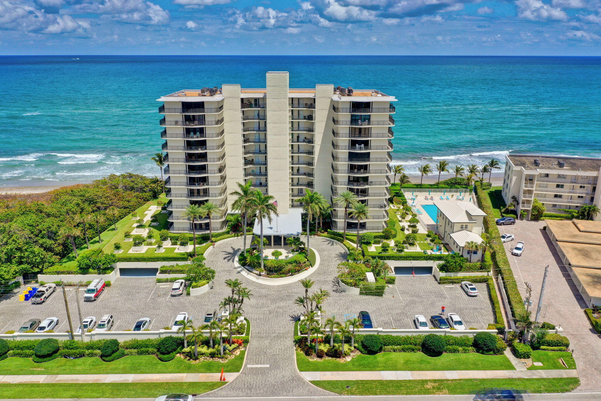Experience Unparalleled Coastal Luxury in this Stunning Oceanfront Upgraded Condo on Jupiter Island. This Beautiful Residence Boasts 2 Master En Suites Complete w/Large Built-In Walk-In Closets, Frameless Glass Showers & New Moen Bidet Toilets w/One Suite Featuring an Oversized Soaking Tub. Gleaming Marble Floors Run Throughout the Condo, While the Open Kitchen Is Outfitted w/Coffee Bar, Wine Fridge, Stainless Steel Appliances & Ample Space For Culinary Creativity. Additional Upgrades Include New Full-Size Washer & Dryer, New Tankless Hot Water Heater & Impact Glass Throughout. The Spacious Living & Dining Area Offers a Perfect Setting for Entertaining or Relaxing, w/Every Room Oriented To Capture Breathtaking Ocean Views. A Terrace Spans Entire Back of Condo w/Walk out Gate that opens.. onto a Serene Grassy Lawn. Amenities Include Sparkling Pool, Clubhouse w/Gym, Kitchen & Sitting Area, Grilling Area and Walkway to the Beach. Close to Fine Dining, Shopping, Golf and Airport.