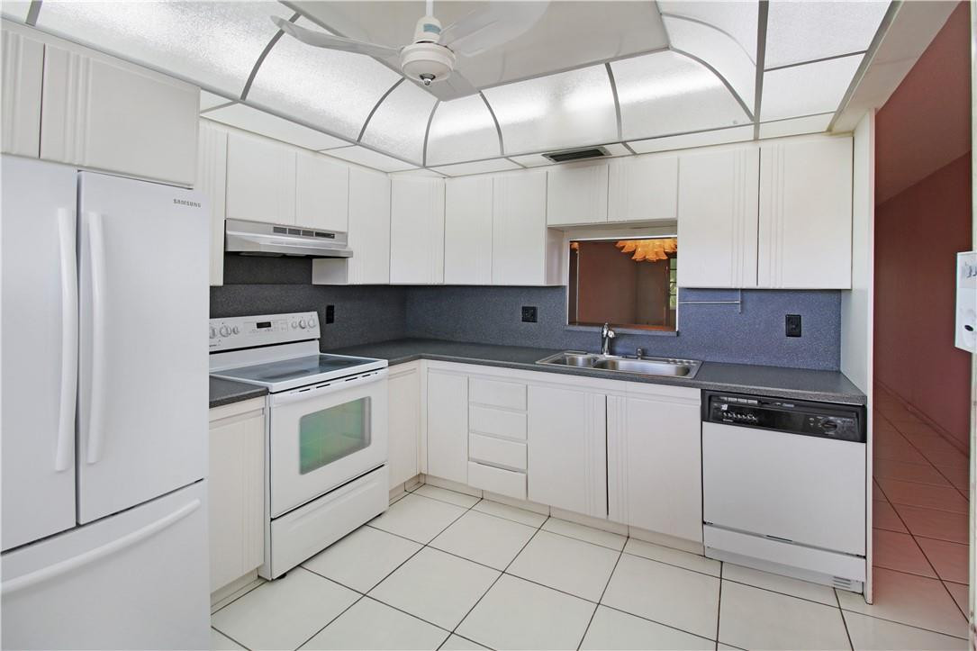 HIGHLY SOUGHT AFTER GRANADA VILLAGE CONDO in the prestigious 55+ GATED community of Wynmoor. You will love the amazing views overlooking the HEATED POOL and garden area. Tons of amenities - heated community pools, BBQ areas, Amazing 18-Hole Golf Course within the community with NO MEMBERSHIP FEES REQUIRED, billiard room, library and much more! BRAND NEW A/C year 2020. This unit has been very well maintained by the same owners for almost 30 years. Tile floor in main areas. Enclosed patio area for comfortable relaxing during all seasons! At least 1 owner/occupant must be 55+. WASHER + DRYER in unit!