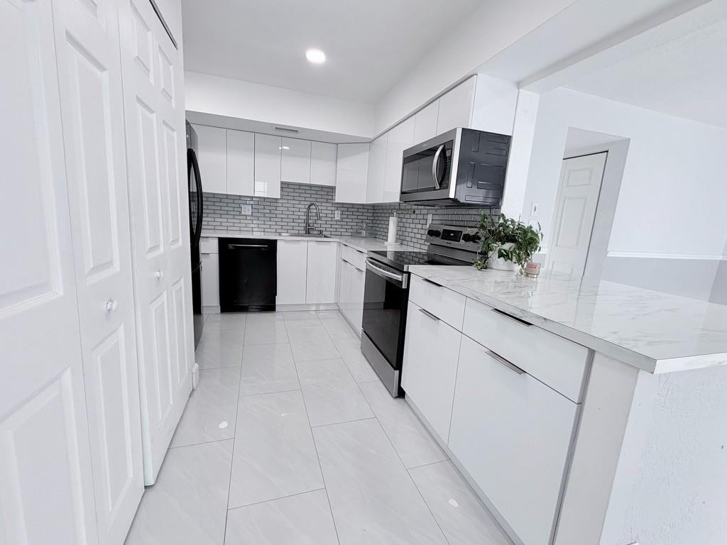 Welcome to this beautifully renovated 3-bedroom, 2.5-bath townhome in a high-demand Davie community, offering a bright, open, and spacious layout. Thoughtfully updated and truly move-in ready.The first floor features tile flooring throughout, enhancing the open-concept living and dining areas, along with a convenient half bathroom. The updated kitchen includes updated appliances, modern finishes, and a functional layout ideal for everyday living and entertaining.Additional highlights include roof maintained by the HOA, no special assessments, a private fenced patio, one assigned parking space plus ample guest parking, and a well-maintained community with pool and children’s play area. Conveniently located near major highways, top-rated schools, shopping, and dining.