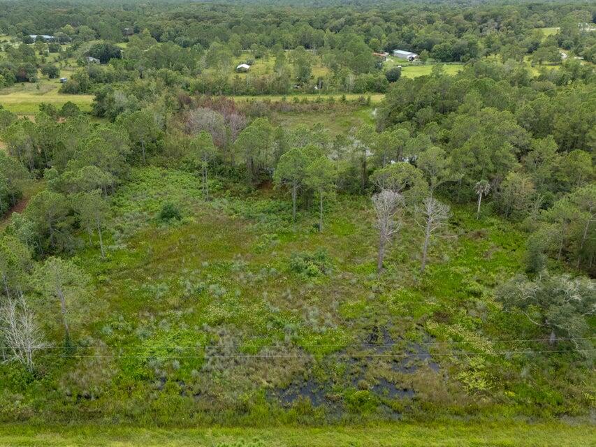 Experience the ultimate in serene country living! This private 5.03-acre retreat is the perfect place to get away