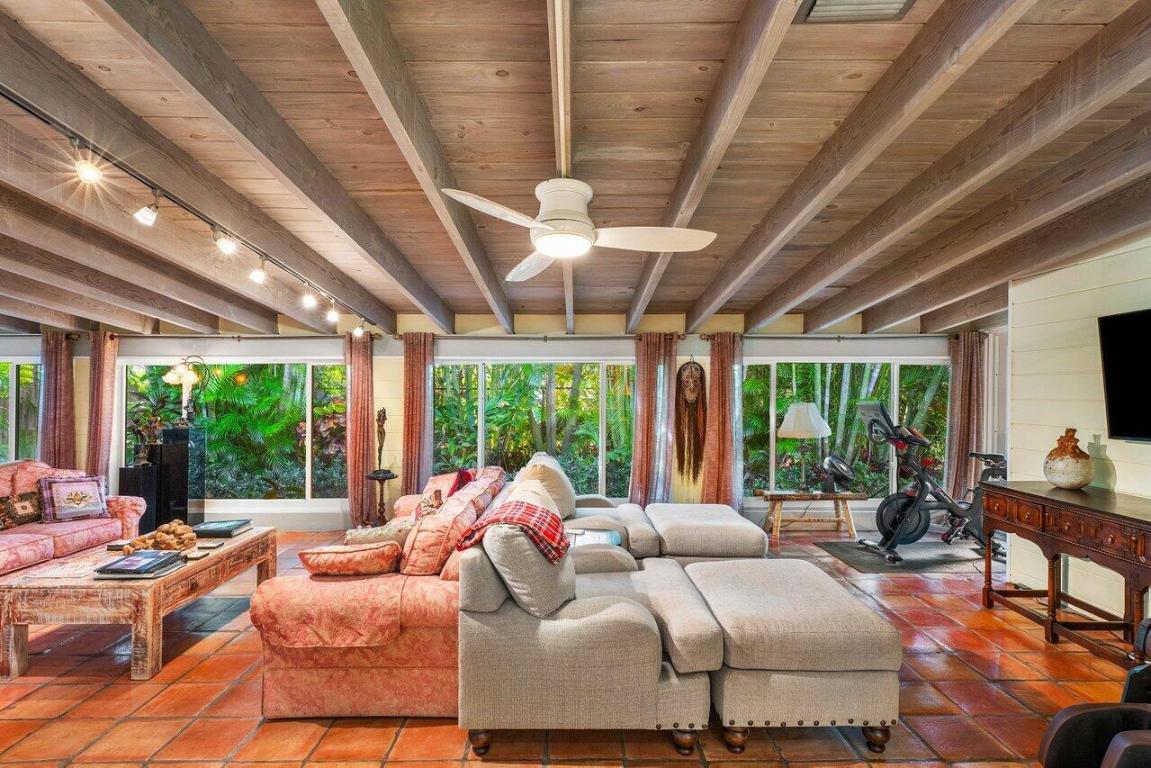 Unleash your creativity and reimagine the potential of this charming Bermuda home nestled on the Northend of Palm Beach. Featuring 4 bedrooms and 4.5 bathrooms, the main residence includes a beamed living room with high ceilings. Outside, mature & lush tropical landscaping frames the property, creating a tranquil oasis for relaxation. A separate one bedroom one bath with kitchenette guest cottage provides privacy and convenience for visitors. Located a short distance from pristine beaches, upscale shopping, and fine dining, offering an unparalleled opportunity to embrace the Palm Beach lifestyle.