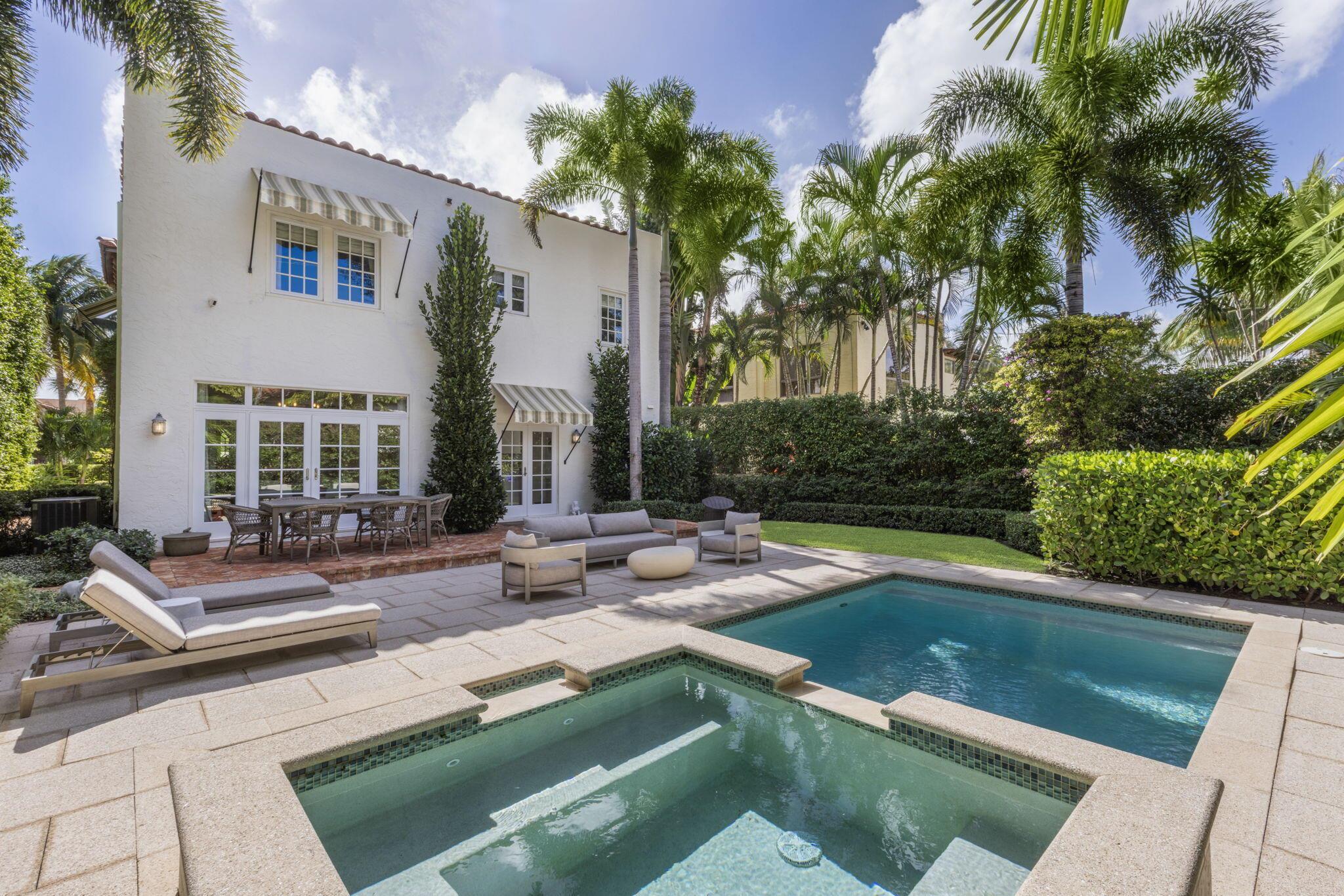A timeless El Cid restored Mediterranean gem, this 4-bedroom, 3.5-bathroom residence is located on the desirable Intracoastal block. Renovated down to the studs in 2018, the home seamlessly blends classic charm with modern sophistication. Expansive, light-filled living and entertaining spaces are enhanced by original wood floors, restored stained glass windows, and pecky cypress ceilings. The newly updated chef's kitchen and full hurricane-impact windows and doors bring clean, contemporary lines to the home's historic elegance. Outside, a resort-style heated pool and mature tropical landscaping provide the perfect setting for relaxation and leisure.