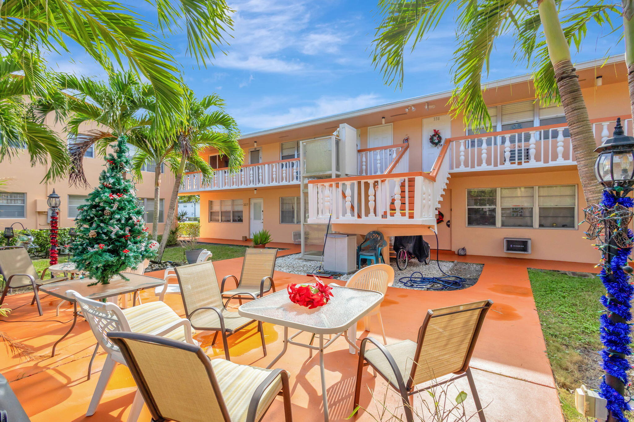 MOTIVATED SELLER! MOVE IN READY 2BED 1.5 BATH 2ND FLOOR CORNER UNIT. LIGHT, BRIGHT, AIRY AND VERY CLEAN. UPDATED BATHROOM, TILED THROUGHOUT, NEUTRAL COLORS,CENTRAL AIR CONDITIONING. GREAT ASSOCIATION.  NEW ROOF, WORKING LIFT, PRIVATE PATIO TO SIT OUT AND RELAX ON.  STEPS FROM THE HASTINGS FITNESS CENTER.  Roomy closets (one walk-in, laundry room, assigned parking spot plus visitor parking available; local bus for errands/shopping both within & outside The Village; COME & ENJOY RESORT STYLE LIVING IN THIS GATED COMMUNITY FOR ACTIVE ADULTS 55 +. CLUBHOUSE features a theater, indoor pool, card room, community/party room, billiard room ,shuffle board ,tennis , pickleball ,bocce and two outdoor pools. Numerous heated outdoor pools throughout he community Separate fitness center (Hastings fitnes (Hastings fitness center) with resistance pool, swimming pool, exercise classes and a gym. Two guarded gates and 24 hour roving security patrol. GREAT LOCATION: close to shops, restaurants, PBI airport and beaches