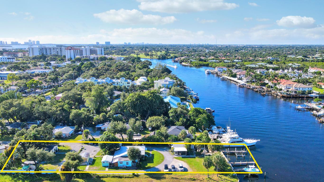 A once-in-a-generation opportunity in Palm Beach Gardens. This is a two parcel combination with one main house and 2 guest cottages, perfect for renovation, income potential, or as the foundation for your new estate.. 2031 Melody Lane and 2021 Melody Lane, gives you .72 acres of waterfront property. It embodies the charm of old Florida with the promise of modern luxury. The property offers 100 feet of deep-water frontage, no fixed bridges, and direct ocean access—ideal for yachts or sport boats. Enjoy breathtaking west-facing sunsets over the Intracoastal from this rare waterfront setting. With no HOA, no restrictions, and medium-density zoning, the possibilities are wide open. This is a rare chance to craft your legacy on the water.