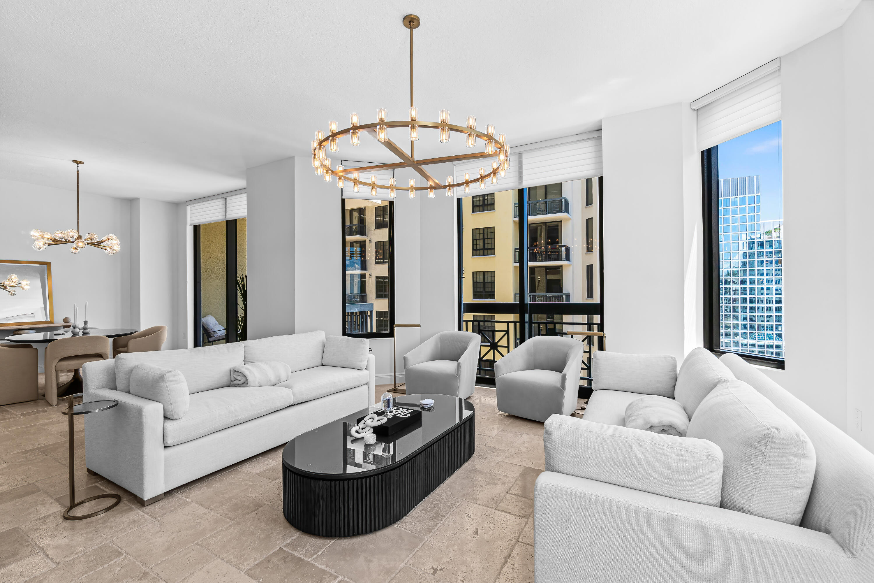 Sophisticated Downtown Luxury with Intracoastal and Ocean Views. Refined living at Two City Plaza, one of downtown West Palm Beach's most coveted addresses. This 2-bedroom, 2 ½ -bath residence has been custom-designed and curated with the finest finishes. The home features a brand-new modern designer kitchen, Restoration Hardware furnishings and lighting that blend modern elegance with timeless style. Floor-to-ceiling impact windows flood the space with natural light and frame views of the water and city skyline. Both bedrooms offer en-suite bathrooms, while the spacious open corner floor plan is perfect for entertaining. Ideal as a corporate residence, seasonal showcase, or year-round retreat, this residence redefines downtown luxury with a seamless blend of comfort and design. Residents enjoy resort-style amenities in this full-service building. Including, 24-hour security, concierge, roof top pool with panoramic views w/ towel service, hot tub, sauna, steam room, fully renovated state of the art fitness center /gym, new outdoor kitchen w/ BBQ area and all new Restoration Hardware furniture, outdoor & new indoor movie theaters, fully renovated club room, table tennis, lanai courtyard w/ water feature, renovated roof top dog park area, complimentary valet parking & exceptional staff. Centrally located in the heart of Downtown West Palm Beach, across from One Flagler offices, 7 minutes to PBIA airport, award winning restaurants, shopping, cultural attractions of the city, Worth Ave, and Palm Beaches. The Next Move Is Yours. Experience the best of West Palm Beach living at Two City Plaza.