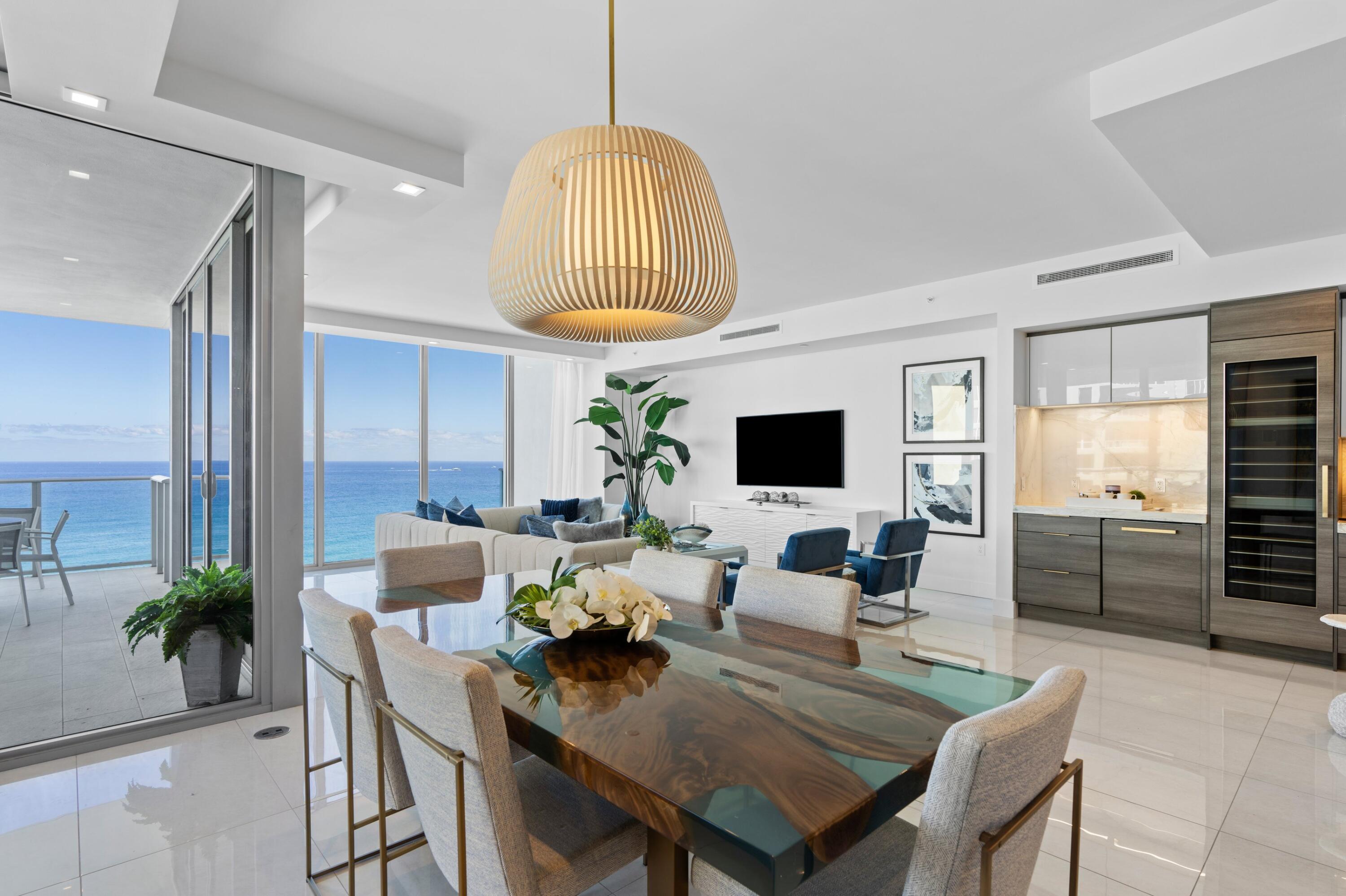 Experience modern ocean-front luxury in a new way from the recently completed 5000 North Ocean in Singer Island. An open horizon of gorgeous water views welcomes you to this 3 bedroom home. The spacious residence boast East to West exposure with nearly 4000 square feet of living space the moment you step out of your private elevator foyer. You are sure to enjoy sunrises and sunsets from the additional 800 square feet of balcony living. Admire the architectural floor-to-ceiling windows that make this home in the sky full of natural light and open to the panoramic views of the Atlantic Ocean. Not to mention it was completed with beautiful fixtures and finishes included in every part of this stunning home. 5000 North Ocean is the newest place to call home on Singer Island. A boutique ultra-luxury building featuring a state of the art fitness center, beautifully designed clubroom, custom designed pool, as well as a 24 hour concierges and manned gate. 5000 N Ocean's beachfront location and unique amenities are sure to welcome you home. This is luxury modern living at its finest.