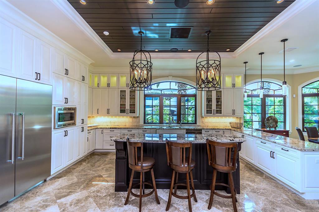 Price to Sell, Owner Relocating!
Exquisite Gated Custom Built Home in Lighthouse Point, 6,786 SqFt, 5 Bedrooms, 5 ½ Baths with a 3 Car Garage and Lift to accommodate 2 Vehicles in One Space. 220' of Deep Water with Large Turning Basin and 10 Min to the Hillsboro Inlet Makes Perfect to Enjoy Your Large Vessel and the opportunity to purchase the Azimut 70 SeaJet Yacht. 2 Jet skis and Double Float Lift Comes With The House. Design Finishes by Lighthouse Interiors Include Marble and Porcelain Wood Plank Flooring, Custom Artisan Tile Work, Phillip Jefferies Specialty Wall coverings, Visual Comfort Light Fixtures, Ralph Lauren Chandeliers, Extensive Specialty Millwork, Mahogany Interior Doors and Intricate Custom Metalwork. Living Room features 16x10ft Euro Wall Accordion Glass Folding Door. Private Observatory Deck & library. Located minutes to Whole Foods, Restaurants and Entertainment.
