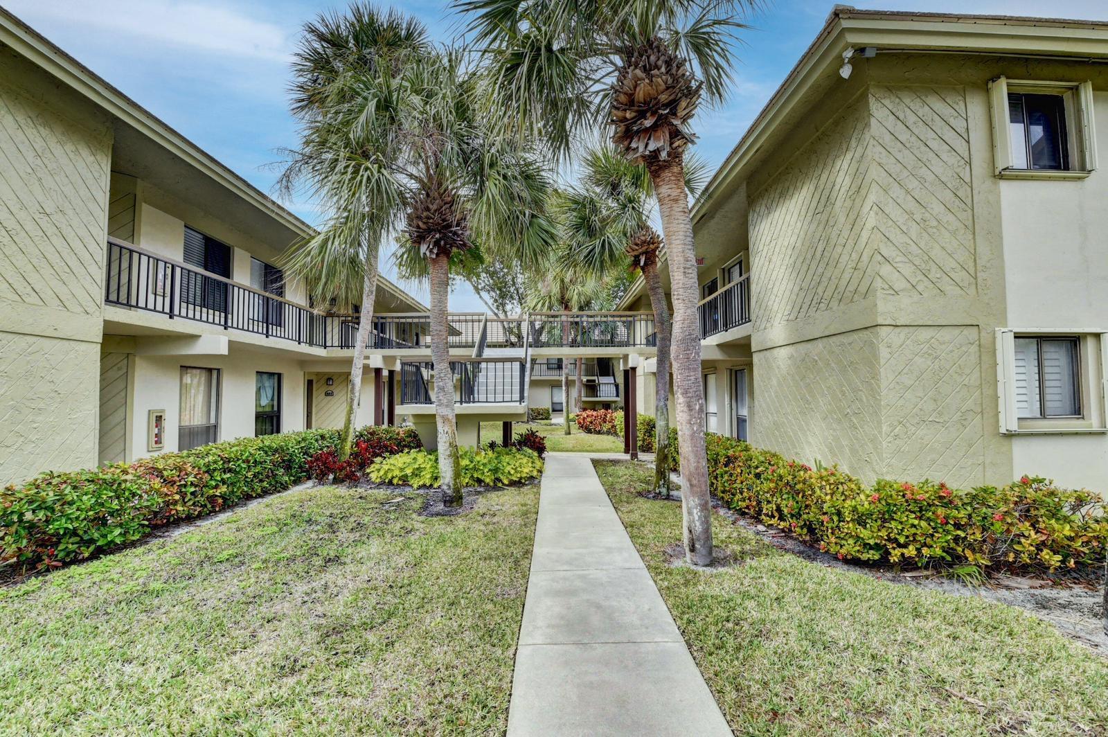 Beautifully kept 2/2 in the heart of East Boca Raton. Impact windows, newly updated kitchen with quartzite countertops / bar, all new kitchen appliances. Full sized washer/dryer. Peaceful neighborhood, Lot's of curbside appeal. Corner unit, bright, natural light, east exposure. Screened-in balcony. Smart thermostat, August wireless front door lock. Bike to the beach, close to downtown, I-95, hospital, Mizner Park, Atlantic Ave, FAU, and so much more! Prime location. Pool & tennis courts. **No pets allowed** Includes water and sewage. 2nd floor apartment.