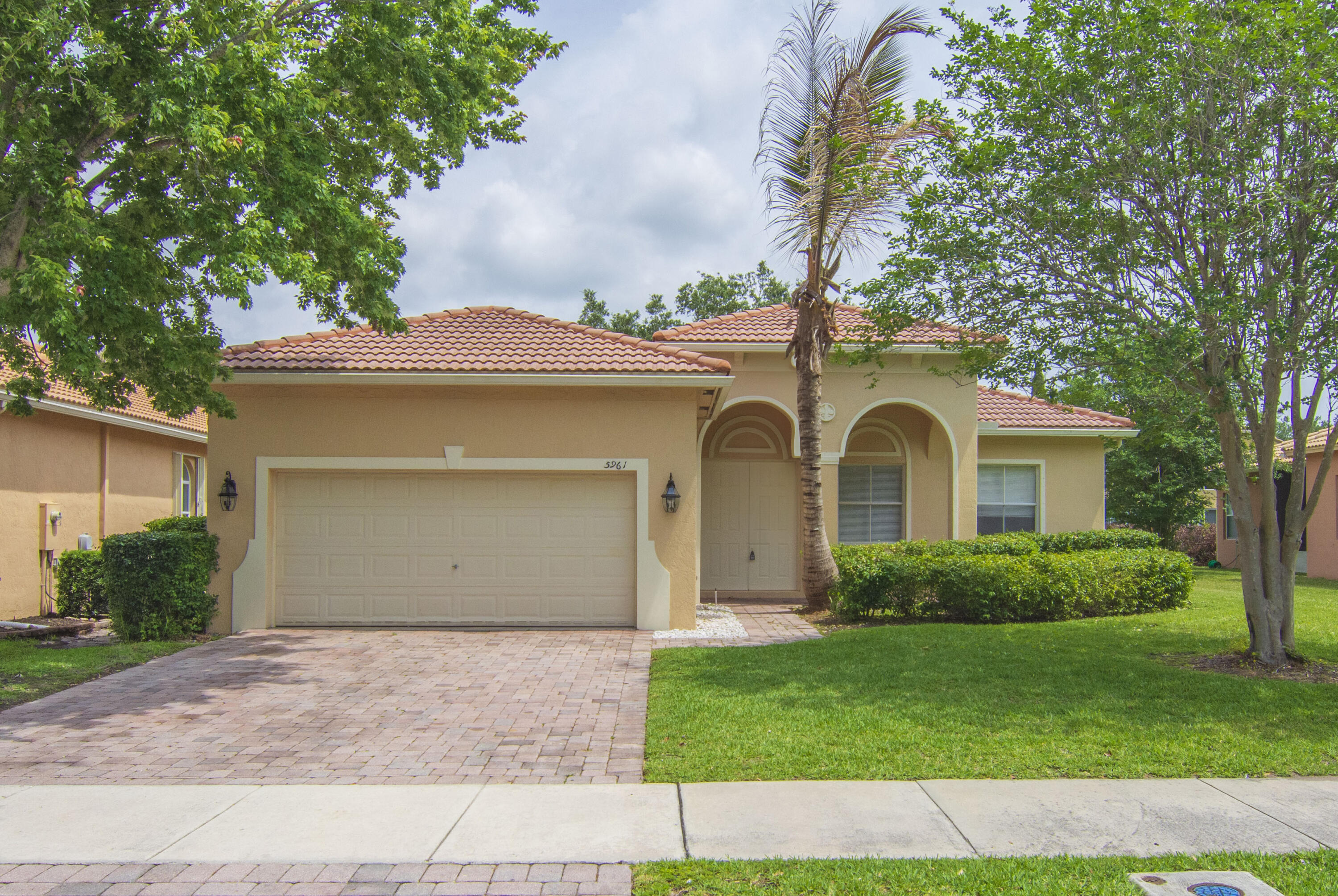 Check out this large 3 bedroom, 2.5 bath home featuring a garden tub in master bath, vaulted ceilings, tile throughout the main living areas and laminate in bedrooms, screened patio in the wonderful, gated Portofino Shores Community. Brand new GE Stainless Steel Kitchen appliance package. New paint inside and out. All sizes approximate. Buyer to verify. Community has sidewalks throughout, gym, playground, tennis courts and pool, etc. Being sold AS-IS with right to inspect.