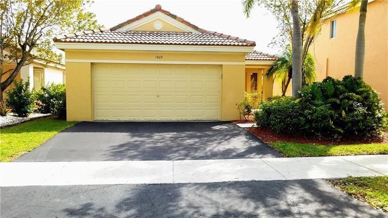 Welcome to this charming three-bedroom, two-bathroom single-family residence located in Savanna of Weston, FL. This well-maintained home offers open concept living space across one story. The property includes a cover private covered back patio, two-car garage, offering convenient parking and storage solutions. Situated in an established residential community with tons of amenties, 24 hour security and "A" rated schools. Make this your next home.