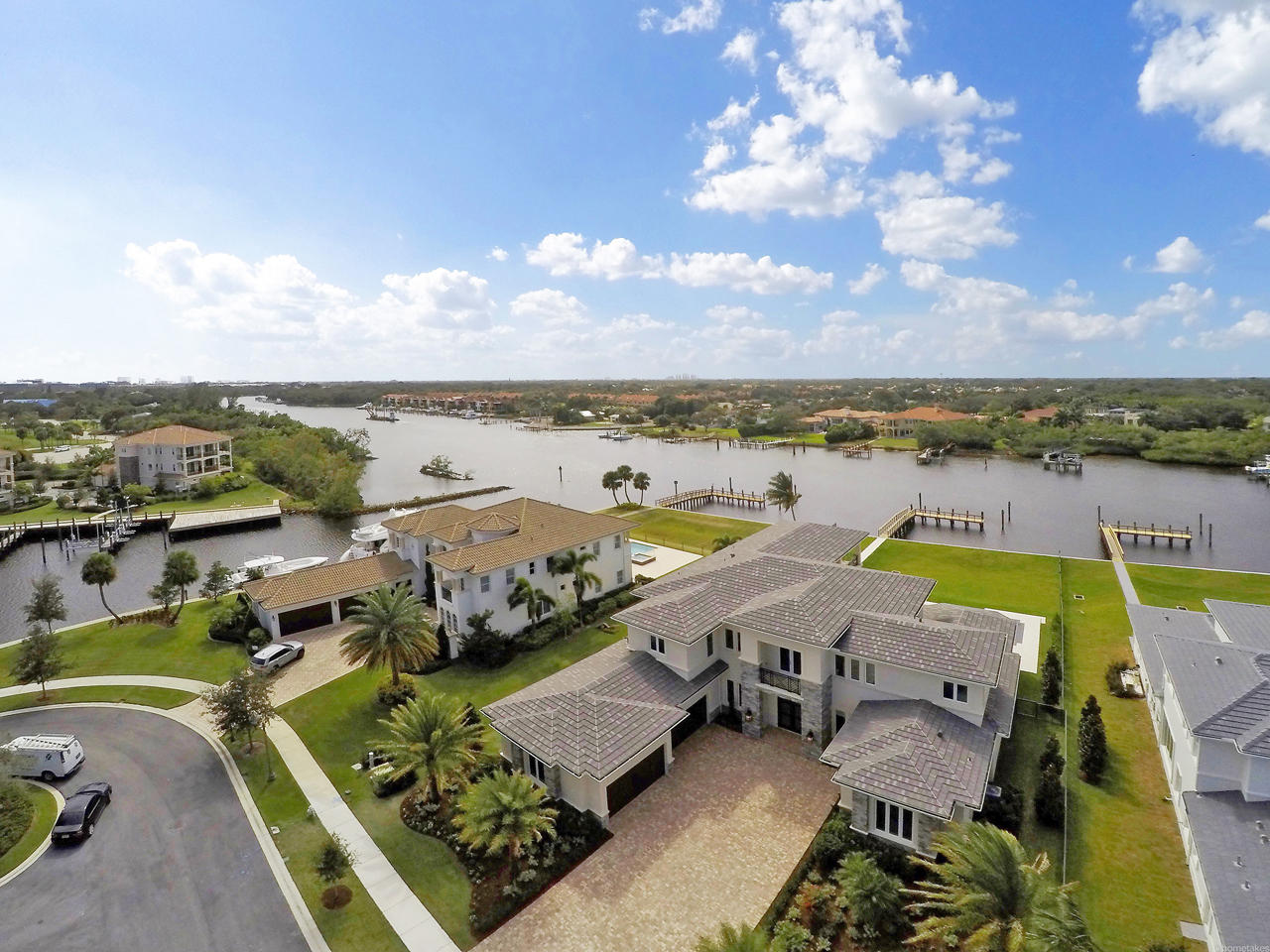 WITHIN THIS PRIZED SETTING IN EXCLUSIVE GATED FRENCHMAN’S HARBOR, LIES A RARE SCOPE OF QUALITY NEW CONSTRUCTION, LUXURIOUS ONE OF A KIND DESIGNER FINISHES AND UNPARALLELED INTRACOASTAL VIEWS. THIS CUSTOM TRANSITIONAL HOME HAS GORGEOUS MARBLE AND WOOD FLOORING THROUGHOUT. AN OPEN GRAND STAIRCASE LEADING TO THE UPPER LEVEL, LARGE WINDOWS THAT INVITE NATURAL BRILLIANCE FROM THE OUTDOORS AND INCREDIBLE VIEWS FROM THE INDOORS. THE GOURMET KITCHEN IS FULLY EQUIPPED FOR THE CULINARY CONNOISSEUR INCLUSIVE OF STATE OF THE ART APPLIANCES. A MOST IMPRESSIVE MASTER SUITE ON THE FIRST FLOOR ENJOYS ITS OWN GLORIOUS INTRACOASTAL VIEWS WITH A SPA LIKE BATH EVOKING SERENITY FROM EVERY PERSPECTIVE. ADDITIONAL FEATURES NOT TO BE OVERLOOKED INCLUDE; EXERCISE ROOM, STUDY, LARGE OPEN LOFT, MEDIA ROOM, EXPANSIVE COVERED UPPER LEVEL BALCONY FEATURING LONG INTRACOASTAL VIEWS OVERLOOKING THE GORGEOUS EUROPEAN EDGE HEATED SALT WATER POOL AND SPA. THIS SOUGHT AFTER LOCATION IS MINUTES TO THE FINEST BEACHES, WORLD CLASS SHOPPING, WATERFRONT RESTAURANTS AND THE JUPITER INLET. THIS HOME IS YOUR DREAM COME TRUE!