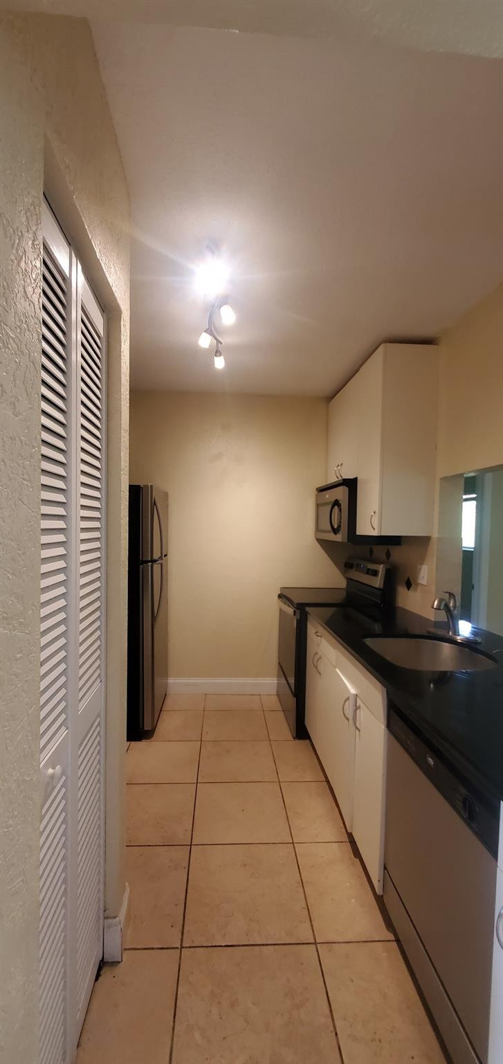 Welcome to this charming two-bedroom, two-bathroom condominium located in the Courtyards at Windsor in Fort Lauderdale, Florida. This two-story residence offers 830 square feet of finished living space, providing comfortable proportions for modern living. The thoughtful layout includes two full bathrooms, ensuring convenience for residents and guests alike. Situated in the established Courtyards at Windsor community, this property presents an opportunity to enjoy condominium living in Fort Lauderdale's vibrant setting. Laundry onsite. Rapid approval and move in possible!
