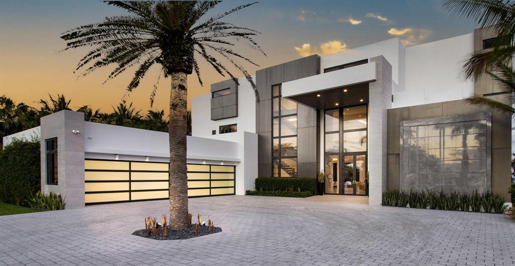 Newly completed Ocean to Intracoastal estate is a masterpiece of design, exclusivity and function. 
Built by  JAG DESIGN and DEVELOPMENT, this spectacular Modern home is sited on almost one and a half acres in prestigious Hillsboro Mile.

The direct Oceanfront property offers 140 feet of ocean frontage, at a very high elevation above sea level (approx. 16 feet),  with a wide sandy beach.

The Intracoastal property offers 140 feet of frontage with a brand new concrete and batter piled seawall, and new 100 foot concrete dock and will accommodate multiple yachting vessels. The intracoastal lot is INCLUDED with the purchase of the OCEANFRONT home only. This exquisite Modern Masterpiece offers 16,000  +- Total square feet with 7 oceanfront Bedrooms, 9 and one half Baths, and an 8 Bay air conditioned Garage. Other rooms include a "Theatre style" Media Room, a two story Living Room with fantastic water vapor Fireplace, and an oceanfront Breakfast Room. The large gourmet Kitchen features, WOLF, DACOR, and MIELE appliances with stunning italian cabinetry.

The luxurious and enormous Master Suite features a sitting area with morning bar, a viewing balcony to enjoy glorious sunsets, and separate HIS and HER ultra sumptuous oceanfront Baths. His Bath offers a steam Room, Her bath is enormous with a large round jacuzzi, separate makeup vanity, and a large sitting room. Both HIS and HER closets are fully outfitted with the finest appointments imaginable.

Other special features include a three story floating glass staircase, two full size Laundry Rooms, and a rooftop patio with Jacuzzi and fireplace.   Some fine details include large scale porcelain slab flooring, special ceiling features, and all LED lighting throughout.  

Quality features include 100% reinforced concrete construction built to withstand winds of 200 mph with all impact windows and doors throughout. 

Resort style outdoor entertaining is enhanced with a summer Kitchen, a covered loggia, and a heated infinity edge salt water pool with raised "wet edge" Spa.  Dramatic outdoor lighting enhances the abundant and expansive tropical landscape and evokes a sense of complete serenity. Steps away, you are at one of the finest white sandy beaches in all of south florida.

DISCLAIMER: The written and verbal information provided including but not limited to prices, measurements, square footages, lot sizes, calculations and statistics have been obtained and conveyed from third parties such as the applicable Multiple Listing Service, public records as well as other sources. All information including that produced by the Sellers or Listing Company are subject to errors, omissions or changes without notice and should be independently verified by any prospect for the purchase of a Property. The Sellers and Listing Company expressly disclaim any warranty or representation regarding all information. Prospective purchasers' use of this or any written and verbal information is acknowledgement of this disclaimer and that Prospects shall perform their own due diligence. Prospective purchasers shall not rely on any written or verbal information provided when entering a contract for sale and purchase.  In the event a Buyer defaults, no commission will be paid to either Broker on the Deposits retained by the Seller. "No Commissions Paid until Title Passes."