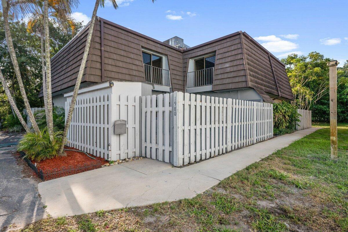 Welcome to this spacious 3-bedroom, 1.5-bath condo in the heart of Jensen Beach! This home features a functional floor plan with generous living and dining areas, an in-kitchen laundry area, and a built-in wet bar that's perfect for entertaining. Recent improvements include a new water heater, while the 2007 roof and 2019 A/C provide added peace of mind. Conveniently located near shopping, dining, beautiful beaches, parks, and vibrant downtown Jensen Beach, this property offers an excellent opportunity for homeowners, seasonal residents, or investors. Being sold AS-IS, this condo is ready for your personal touches to make it your own.
