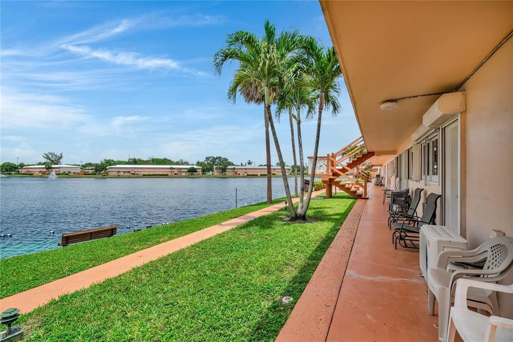 First-floor corner unit with a stunning lake view, fully furnished and featuring an updated kitchen with granite countertops. Includes impact windows and a newer A/C for added comfort. Located in a wonderful community featuring a pool with beautiful lake views, shuffleboard, clubhouse, organized activities, and more. Conveniently close to shopping, restaurants, and public transportation.