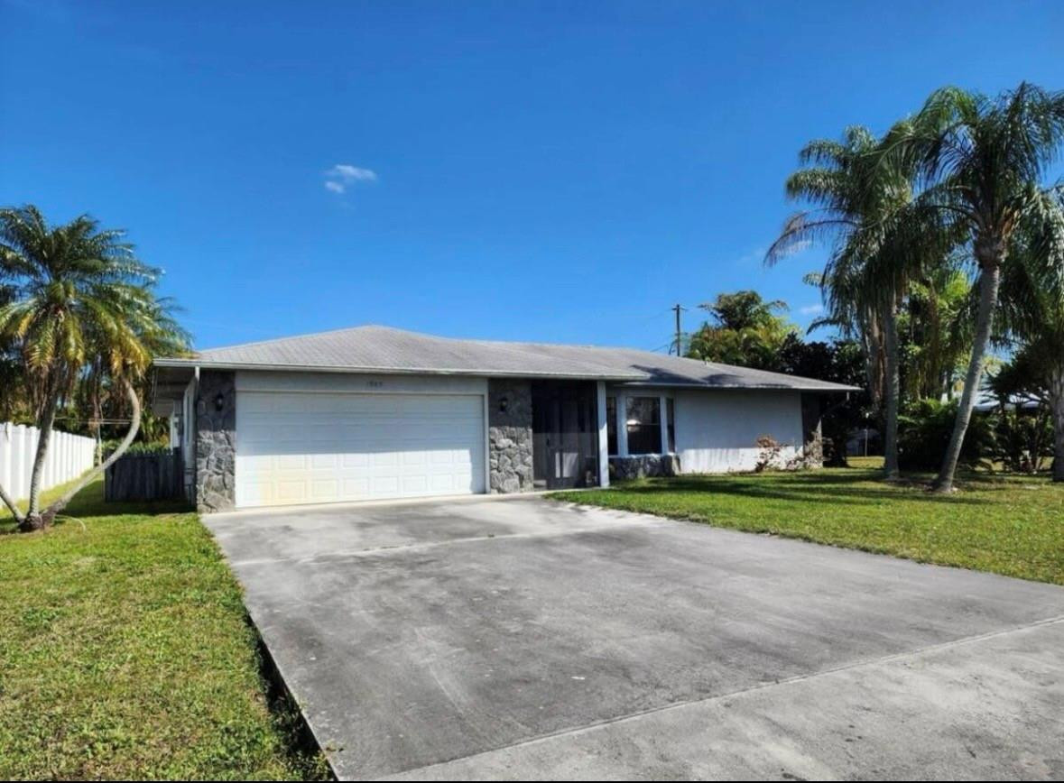INVESTOR SPECIAL @ 7% return!!!  Listed below appraised value for quick sale. Newly renovated four bedroom two bath turn key house with large lagoon pool & fully fenced backyard for privacy. Hurricane Panel Shutters. New AC unit, and new Air handler, hot water heater, dishwaher, bathrooms, new waterproof vinyl flooring throughout, cellular blinds, electrical outlets/switches, newly resurfaced pool, and more. 15 minutes from the Jensen beach! Located in Sandhill Crossing super close to the Treasure Coast mall, movies, the Super Walmart, Publix, and much more.  Showings allowed after an accepted offer.