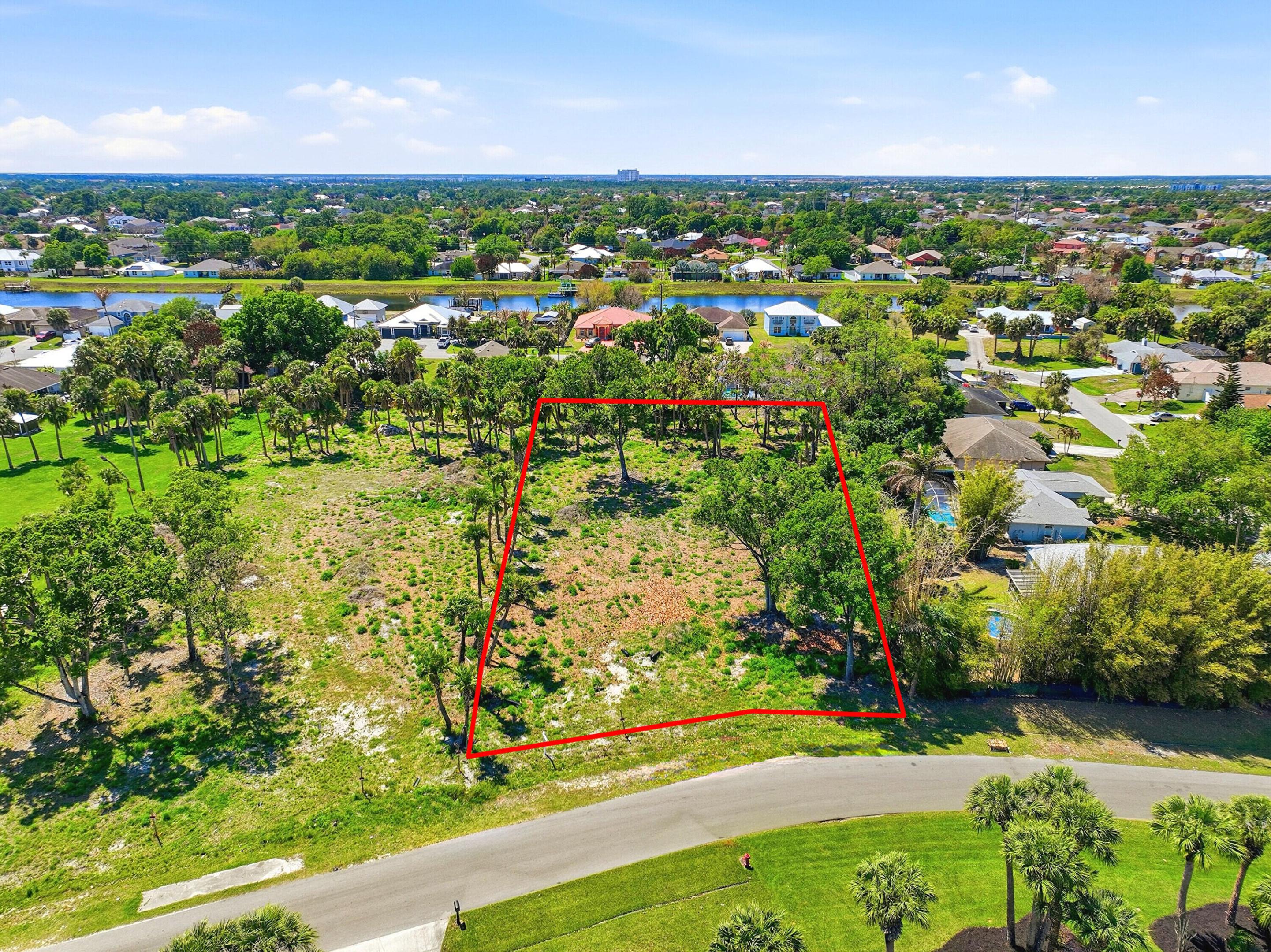 Rear find! One of a kind Estate Lot/ Parcel located in a highly desirable area of Port St. Lucie. This just over one acre parcel is adjacent to another just over one acre lot providing many growth opportunities The current Zoning permits allow for Residential housing, Assisted Living, Schoolhouse, Group Home or Rehabilitation Facility. Re-zoning with city approval would allow a secondary structure (guest house, workshop or a large garage). Just minutes away from shopping, schools, restaurants, hospitals, I-95, the turnpike, City park & boat ramp within a block of the parcels. City water & sewer available. Seller prefers to sell to someone looking to build a larger then 4,000 sq ft home. Seller is a builder. Cleared & dry land.