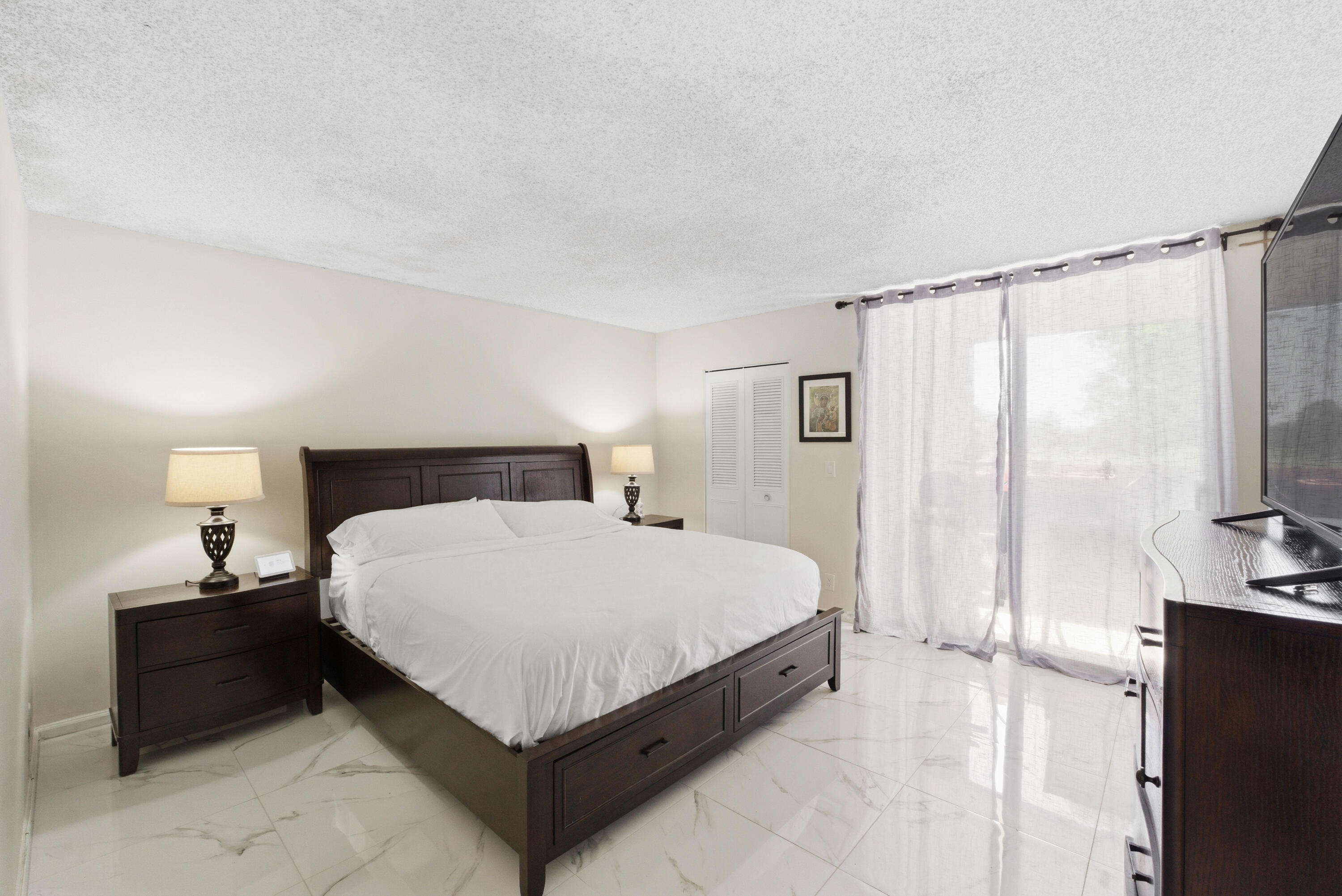 Welcome to this beautifully renovated condo in the heart of Margate! This stunning 1,100 sq. ft. residence features modern upgrades throughout, including brand new flooring, a fully updated kitchen, and a stylishly remodeled bathroom. Enjoy bright and spacious living areas that flow seamlessly to an oversized private balcony  perfect for relaxing or entertaining. Move-in ready and designed with comfort and style in mind, this home is the perfect blend of modern living and convenience. Close to entertainment and shopping centers.
