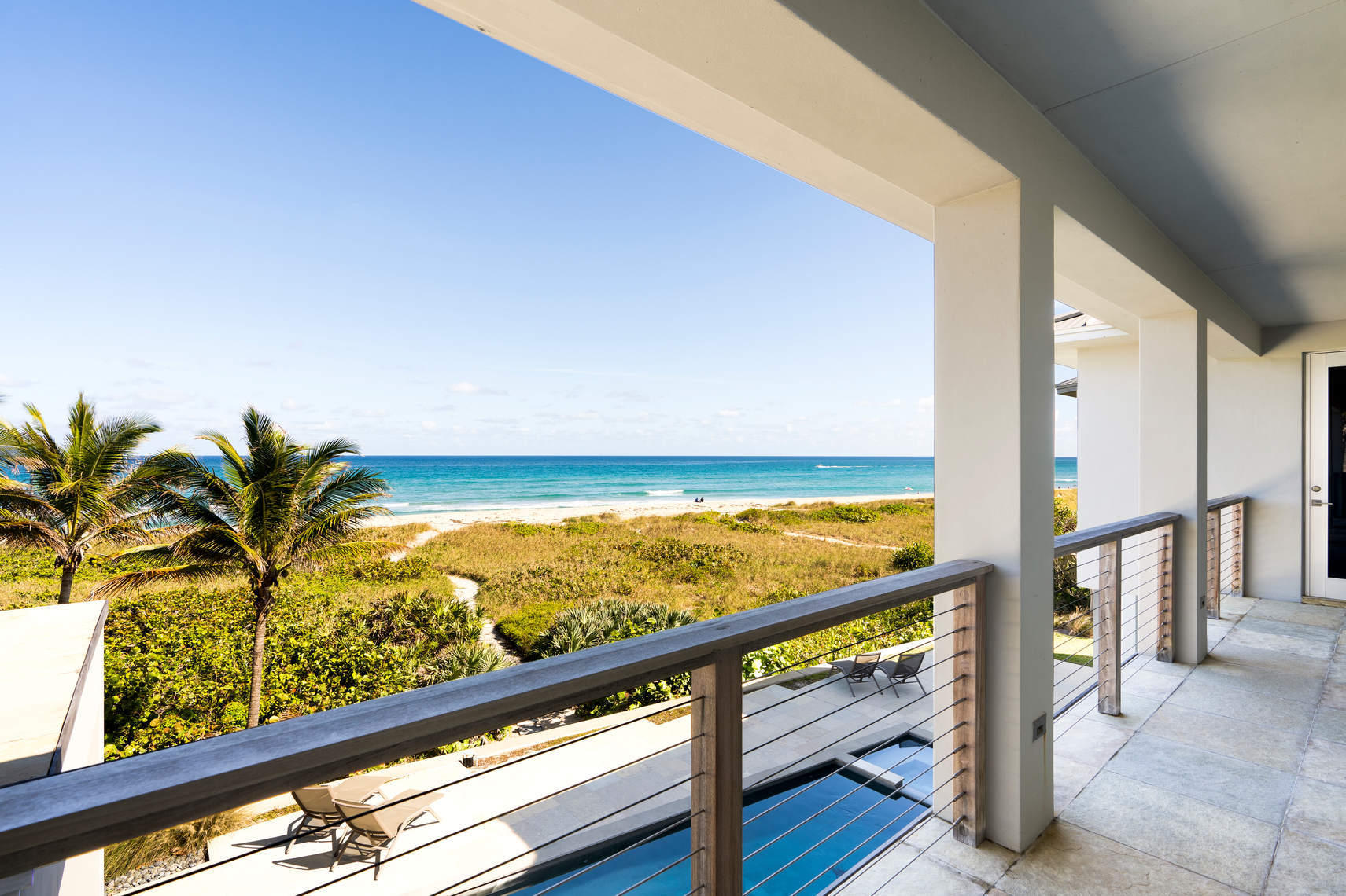Ideally situated on one of Delray Beaches best oceanfront locations sits a new standard in Coastal Contemporary Luxury living. As you enter through the front gates of this home a complete renovation is revealed which created a casually sophisticated ''beach house'' with over 7100 sq feet of air conditioned living with spectacular ocean views from all vantage points. This 7 bedroom 7.5 bath home features an additional upstairs ''family room'', fitness center & office area. Cool, clean finishes such as slate and Ipe wood floors complement the azure waters of the Atlantic & soft sandy beach just outside the door. A lower level master suite & two guest suites are designed for privacy as well as first floor convenience. Upstairs features a family room with walkout balcony & endless ocean views. This house is designed to enjoy living on the beach and is architecturally focused in this regard. The chefs kitchen features an over sized island and abundant cabinetry, storage and commercial grade appliances. Upstairs and Downstairs Laundry Rooms for added convenience.  Full Service Elevator.  Full Hurricane Impact Glass, Metal Roof and Whole House Generator keeps you prepared for whatever Mother Nature delivers. Step outside to the heated pool and swim laps while the waves breaking on the shoreline create a backdrop incomparable to most anything. Walk down the private beach path through the sea grass naturally protecting the dunes then walk or run the beach or just disconnect from the world. The choice is yours.  711 N Ocean Blvd is where the City meets the Shore.  Your next day in paradise awaits...